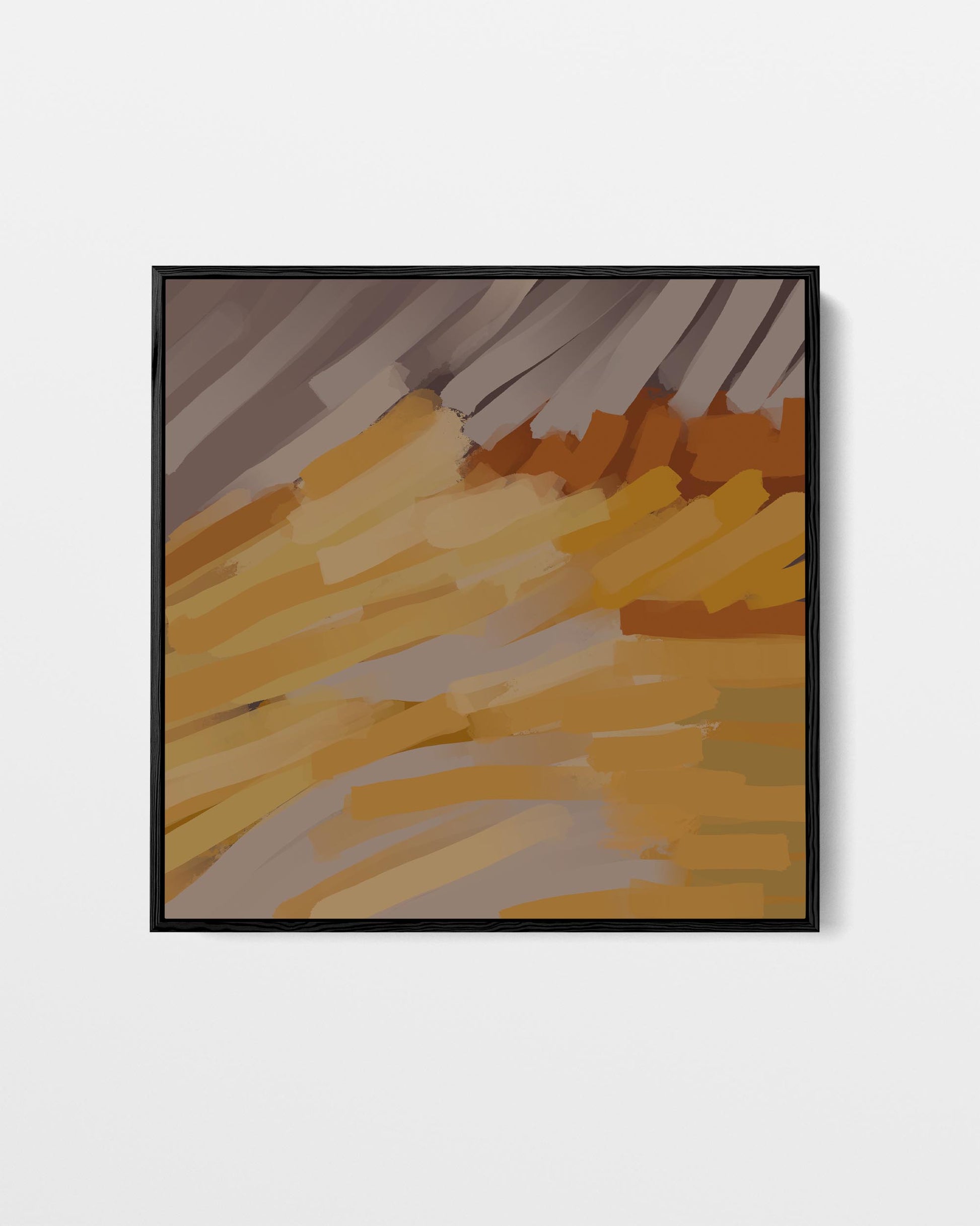 Abstract art print with brown and orange brush strokes in a black frame on a white background