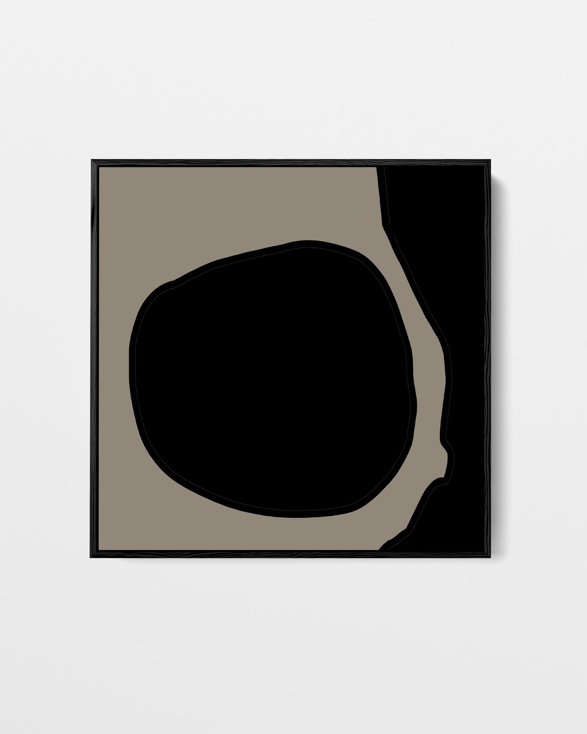 Abstract art print with a black circle on a beige background