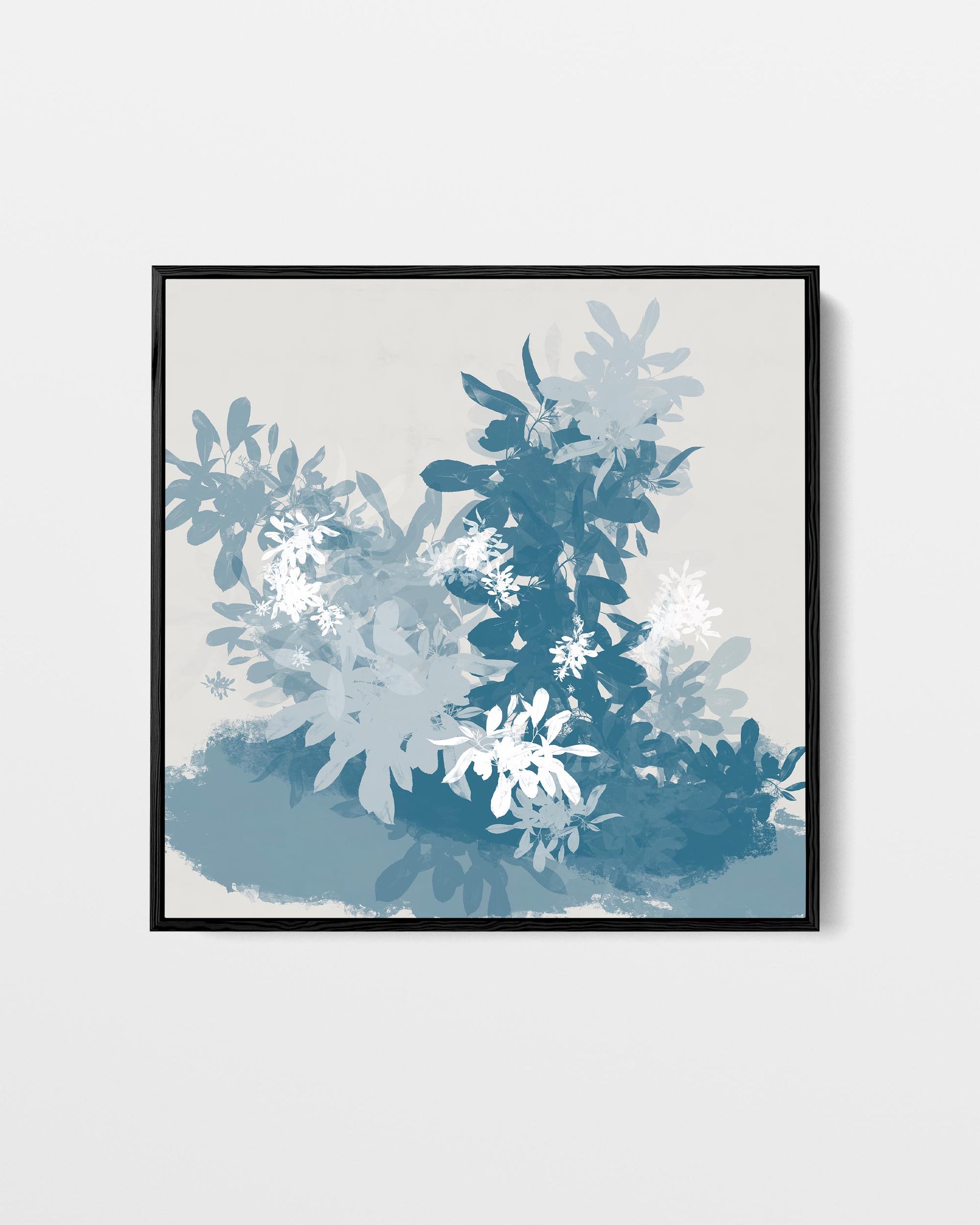 Framed artwork with blue and white abstract design on a light gray background