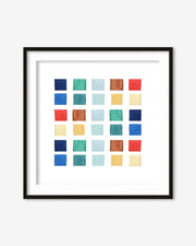 Framed artwork with a grid of colorful squares on a white background
