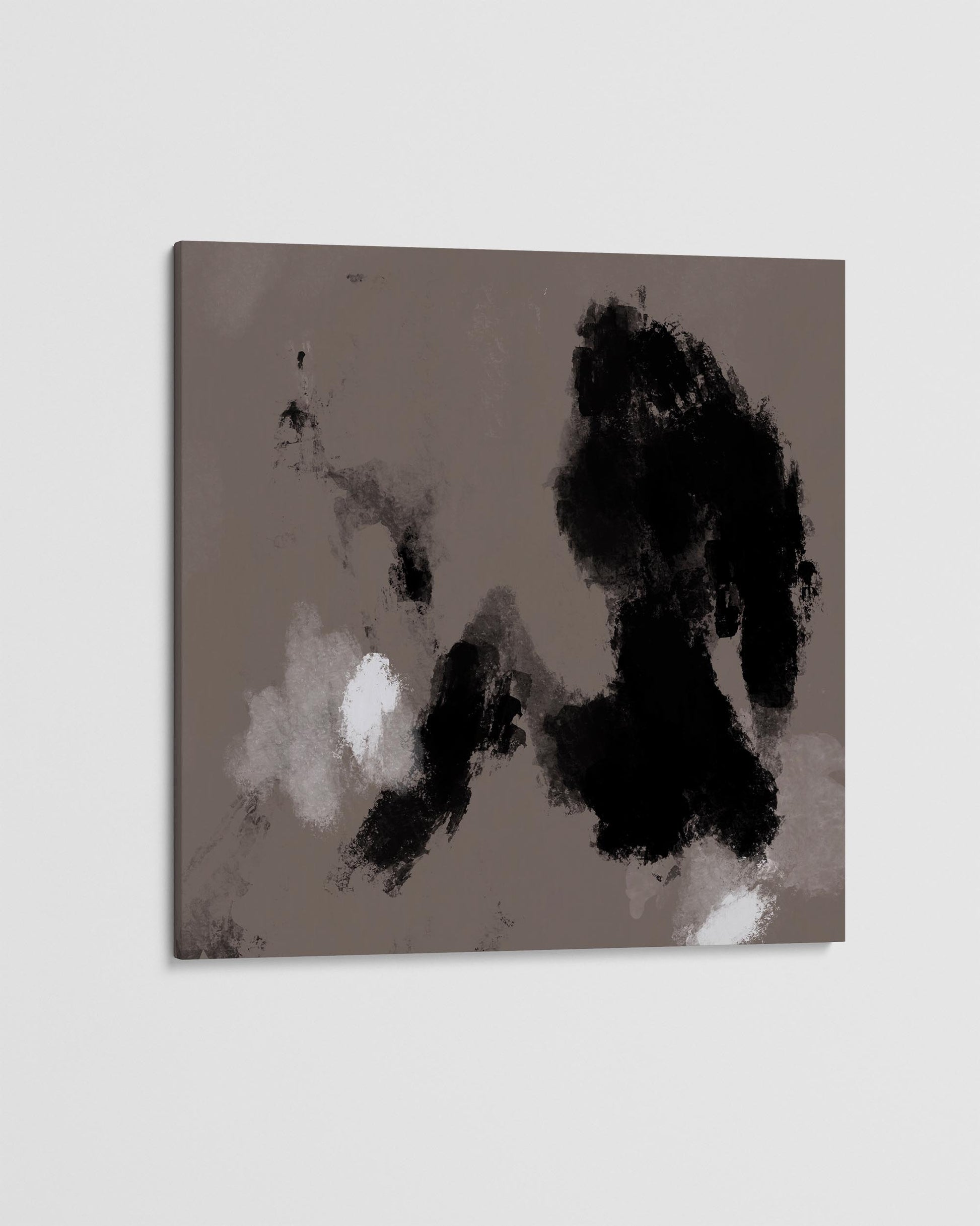 Abstract art piece with black and white brush strokes on a beige background