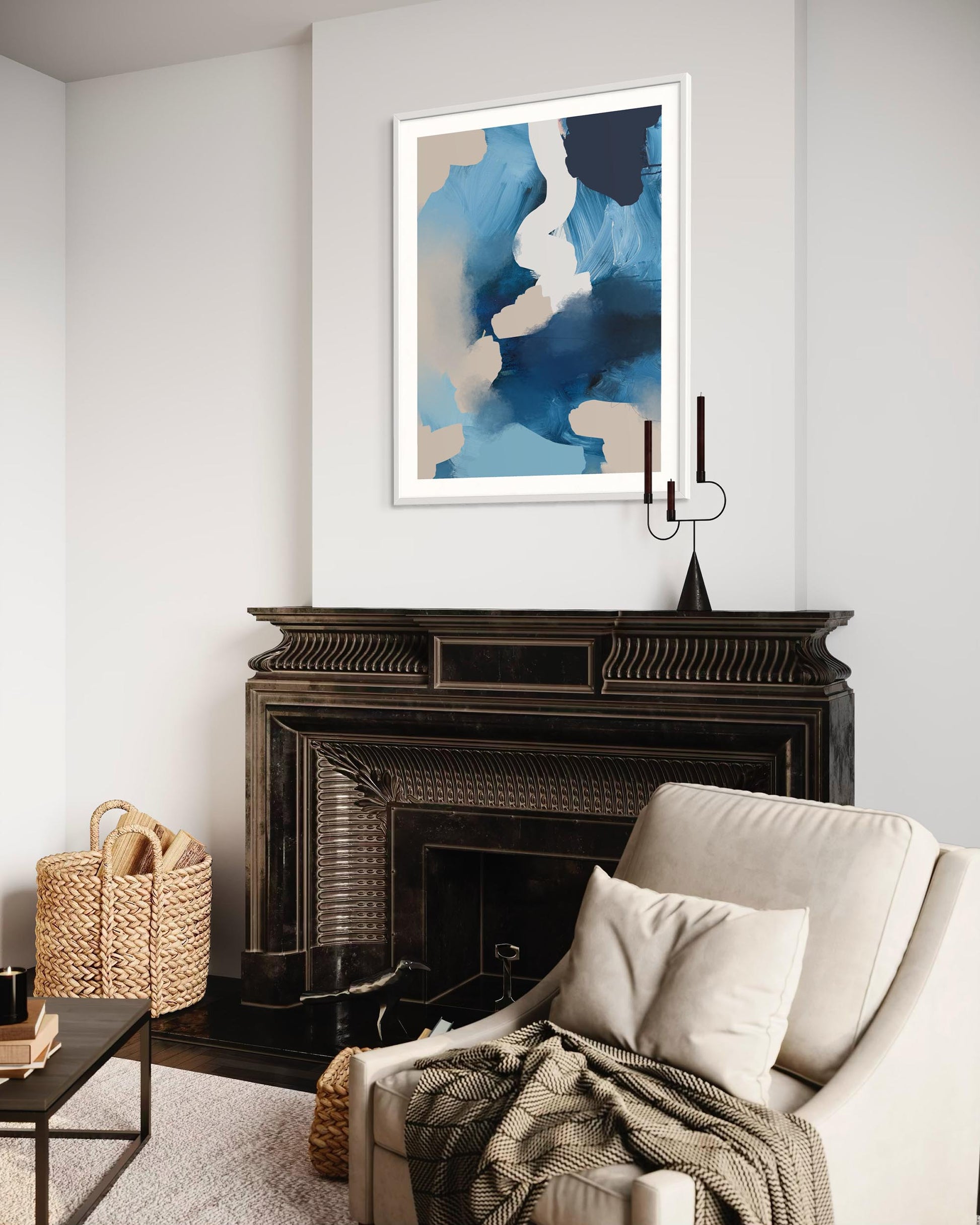 Living room with a fireplace, abstract art above it, and a beige armchair.