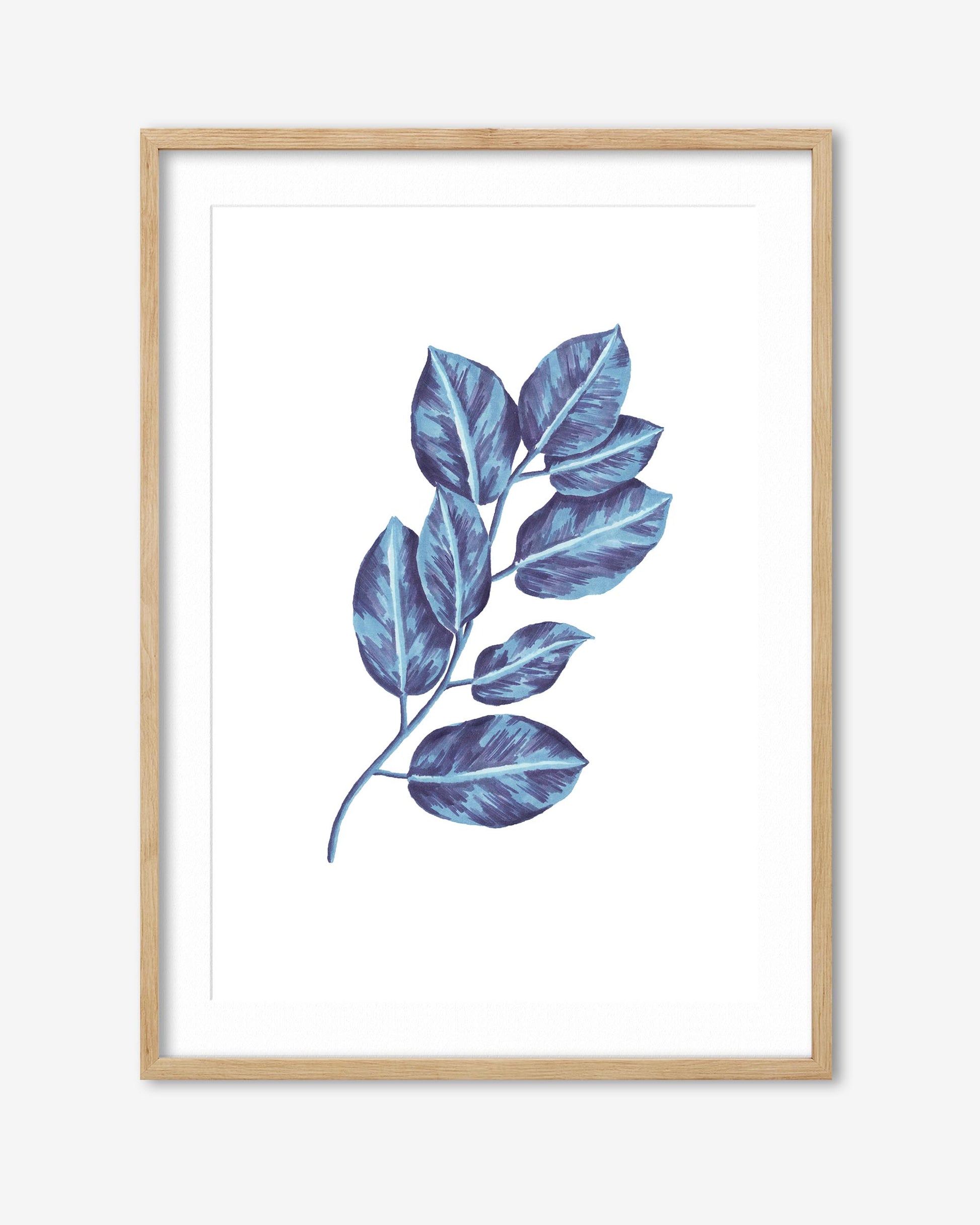 Framed artwork of blue leaves on a white background
