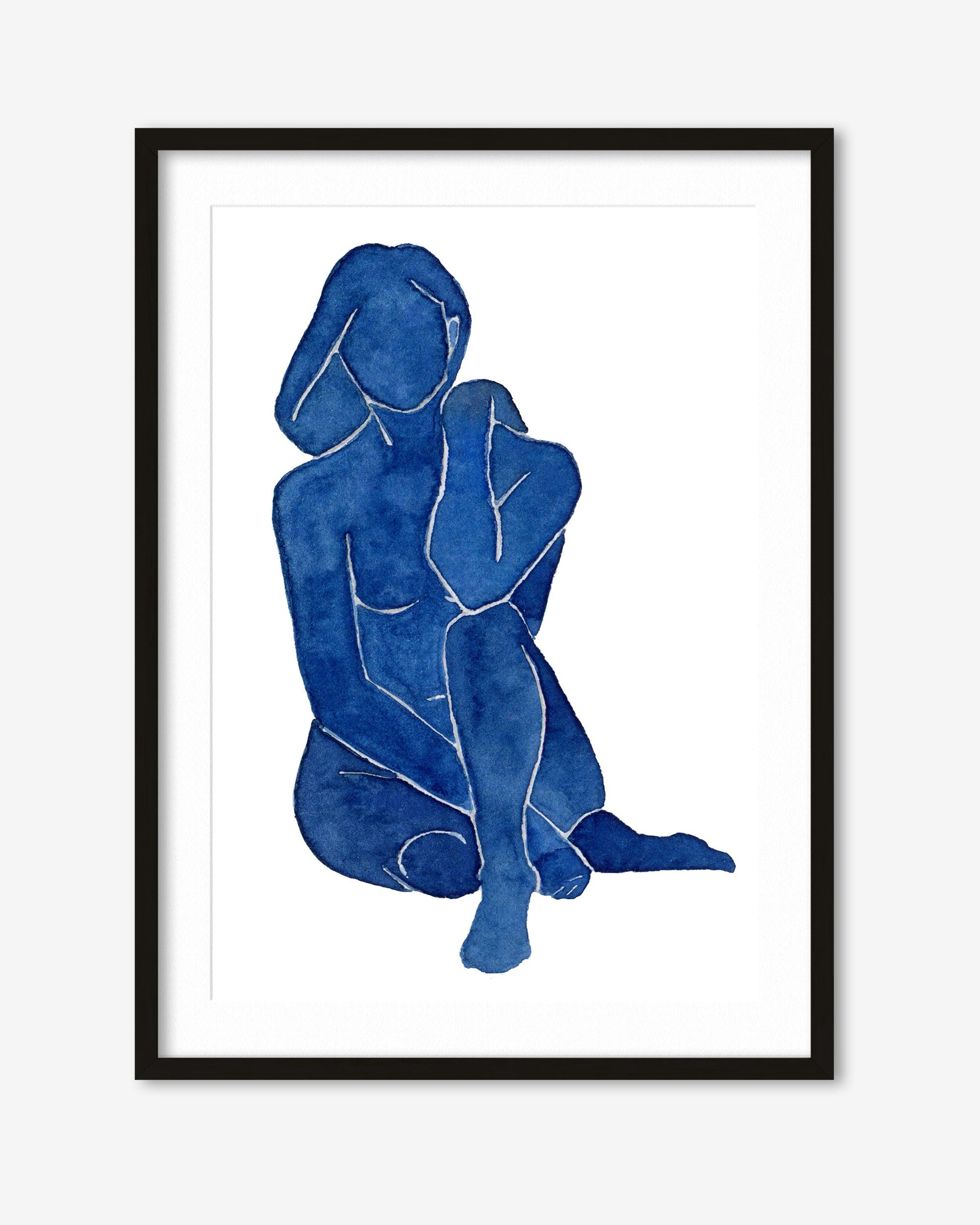 Framed artwork of two blue abstract figures on a white background
