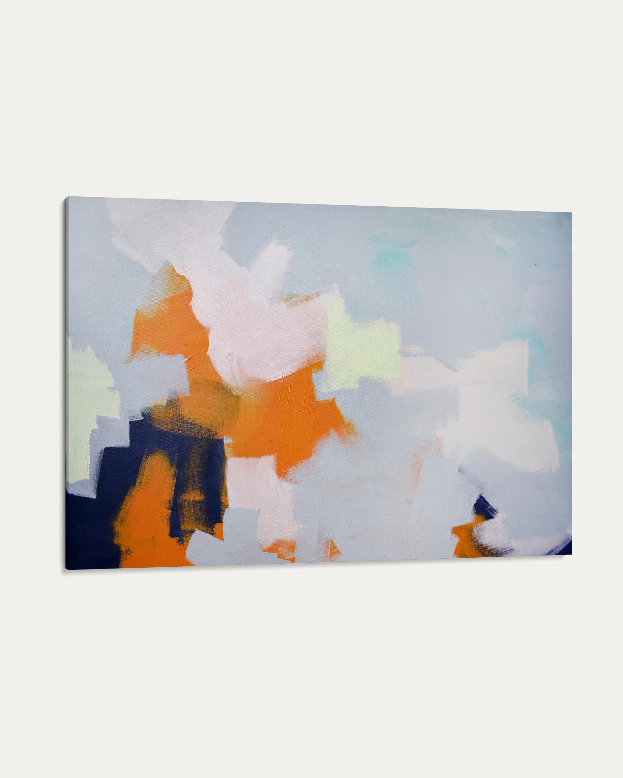 Abstract art piece with colorful shapes on a light blue background