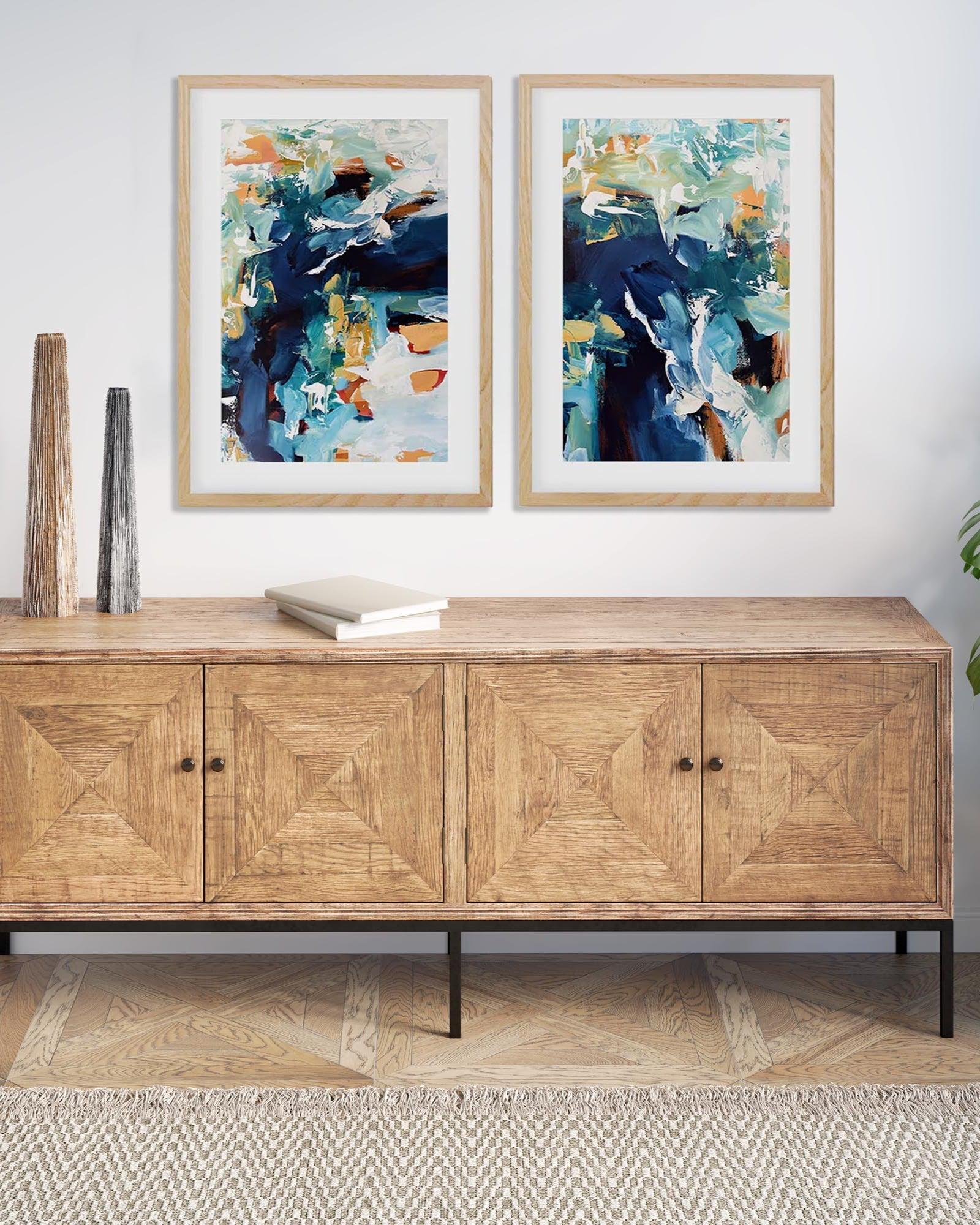 Wooden cabinet with abstract art on a wall