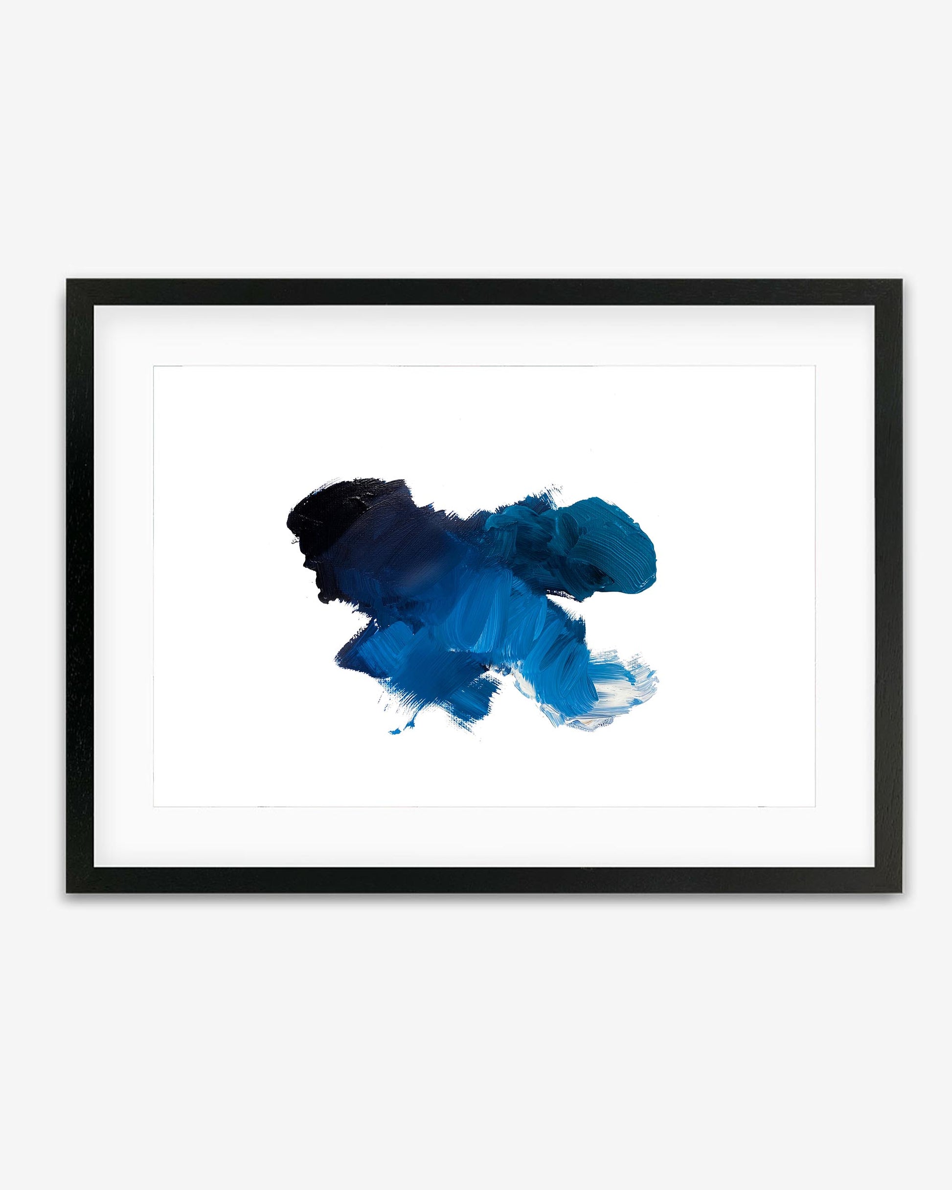 A framed art print featuring an abstract blue paint palette design in a black frame.