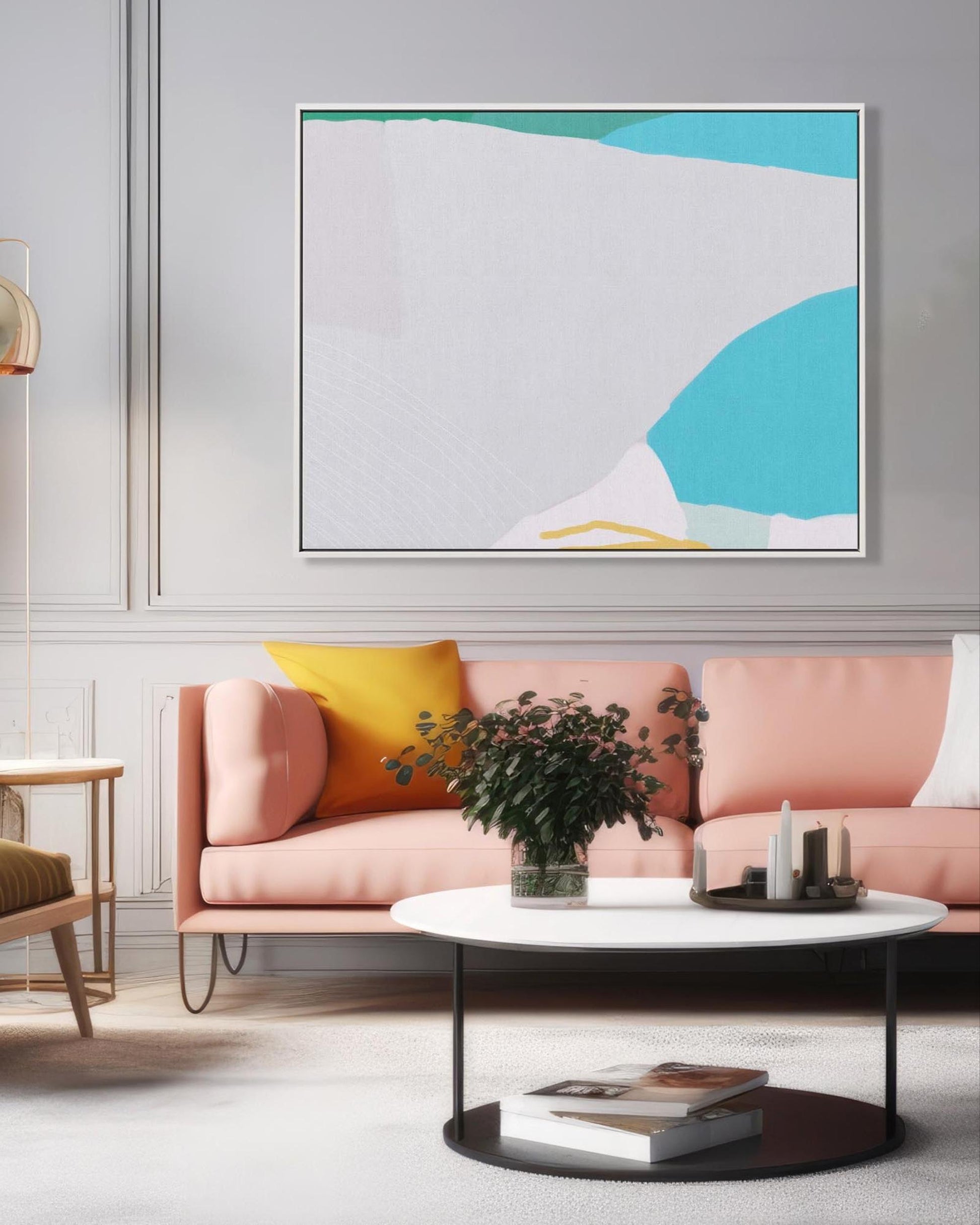 Modern living room with a pink sofa, abstract art, and a round coffee table.