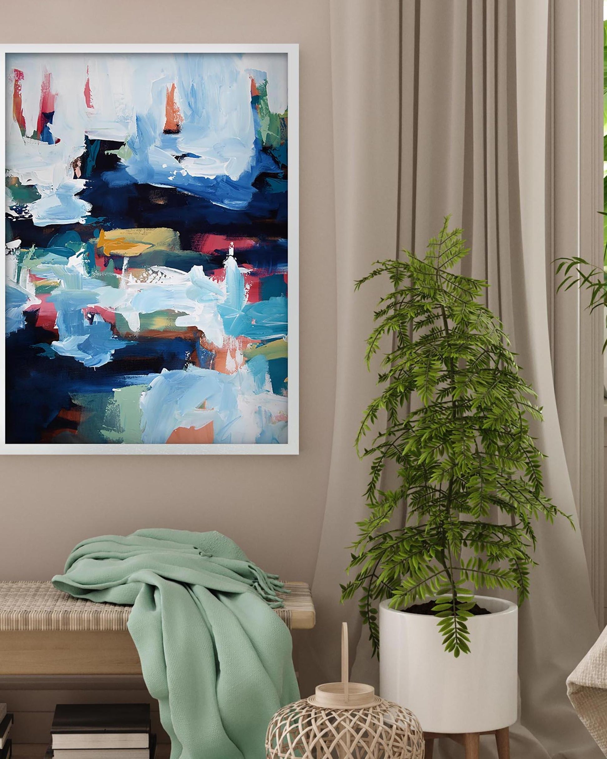 Abstract painting on a wall with a plant and bench in a room.