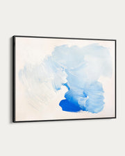 Framed abstract art piece with blue watercolor design on a white background
