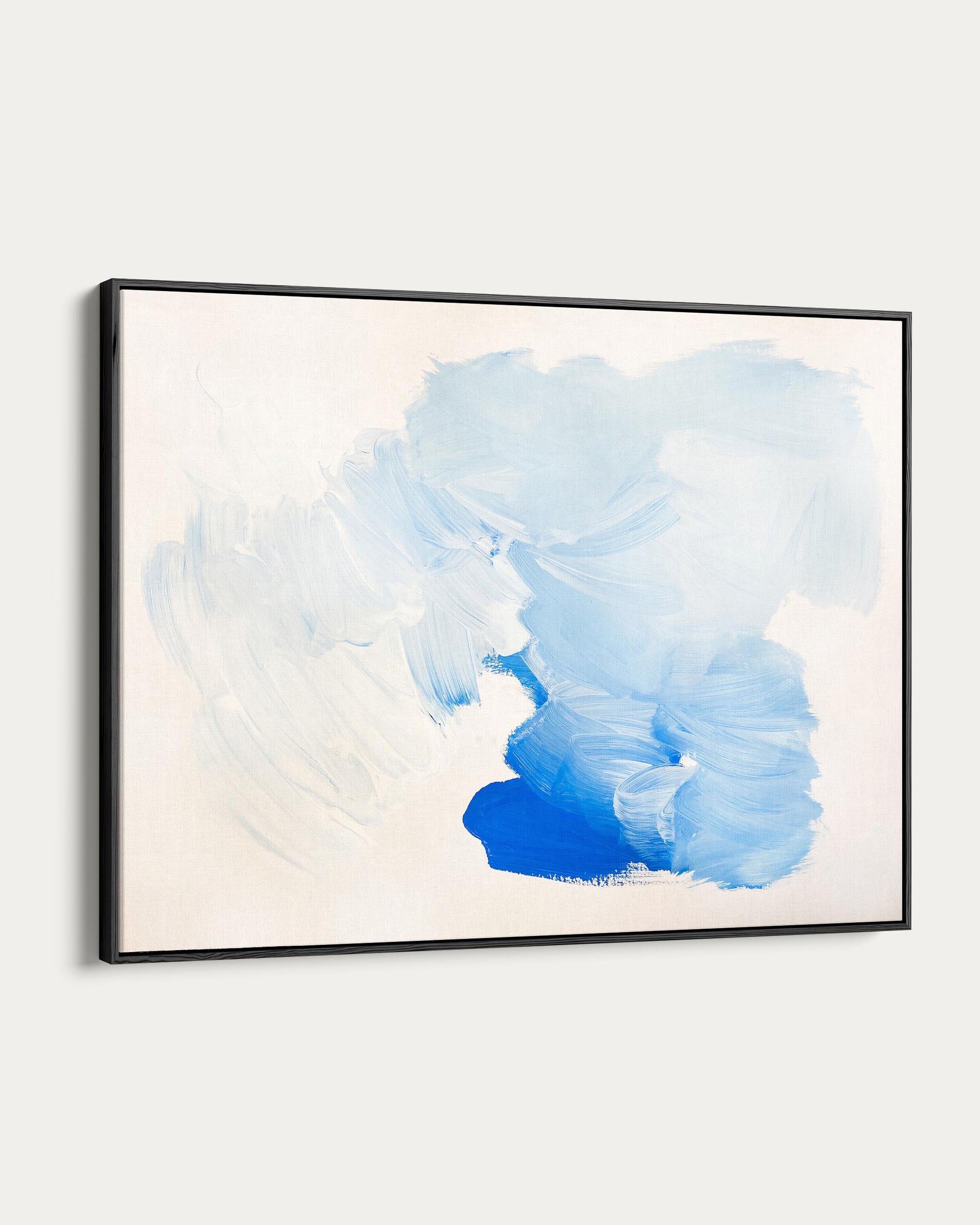 Framed abstract art piece with blue watercolor design on a white background