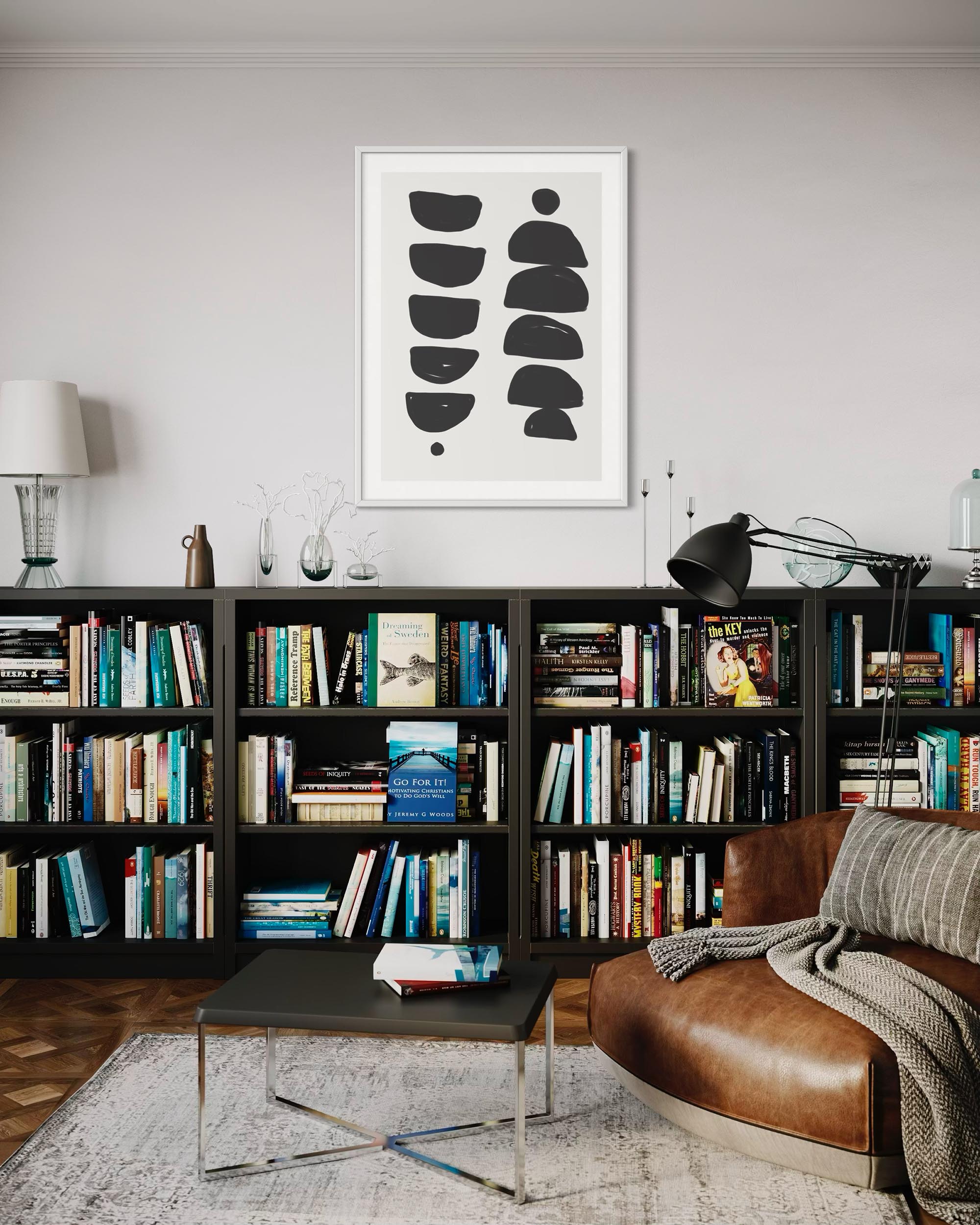 Modern living room with bookshelf, sofa, and abstract art on the wall.
