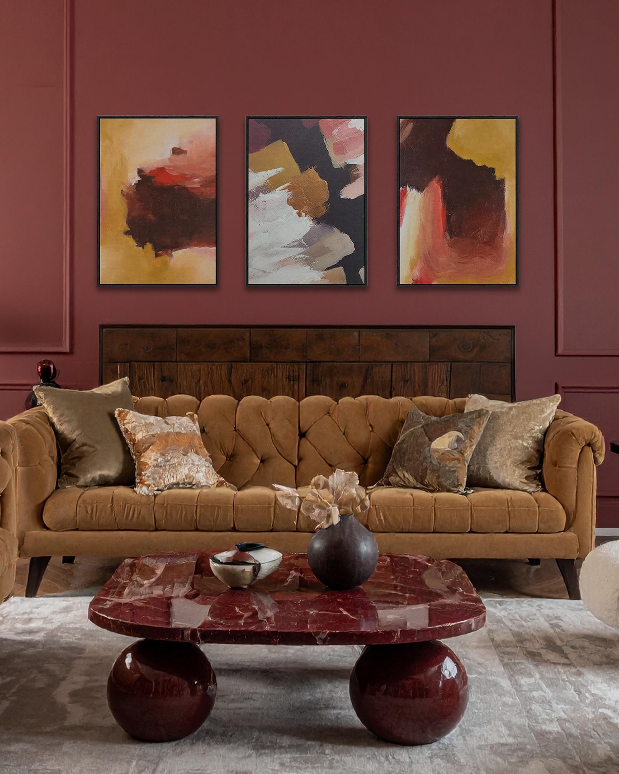 modern bold burgundy living room with re marble table ball legs with modern abstract expressive canvas art on wall