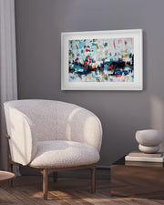 Modern interior with a textured armchair, abstract painting, and side table.