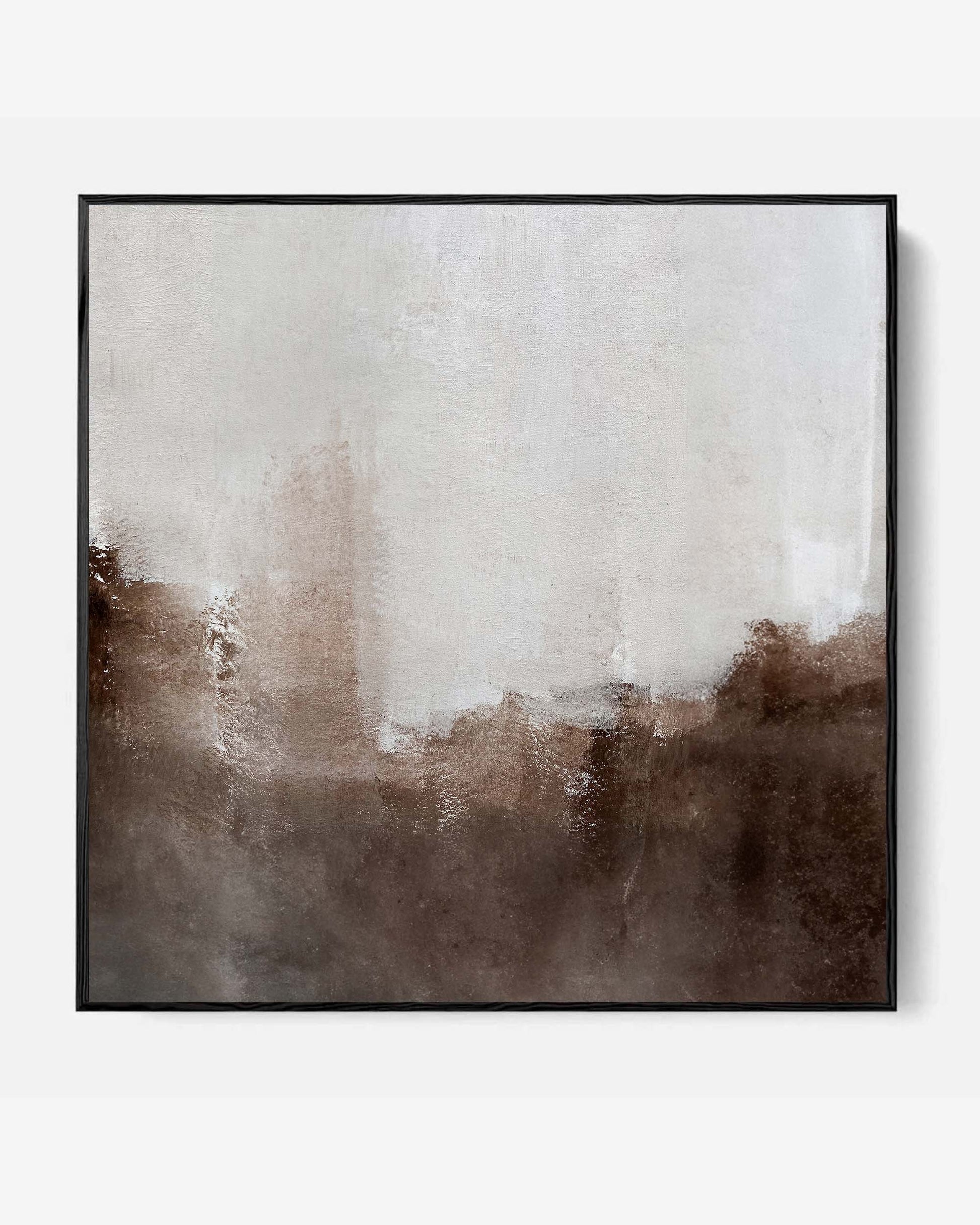 A framed canvas featuring a dynamic abstract design in muted earthy tones, predominantly brown and white.
