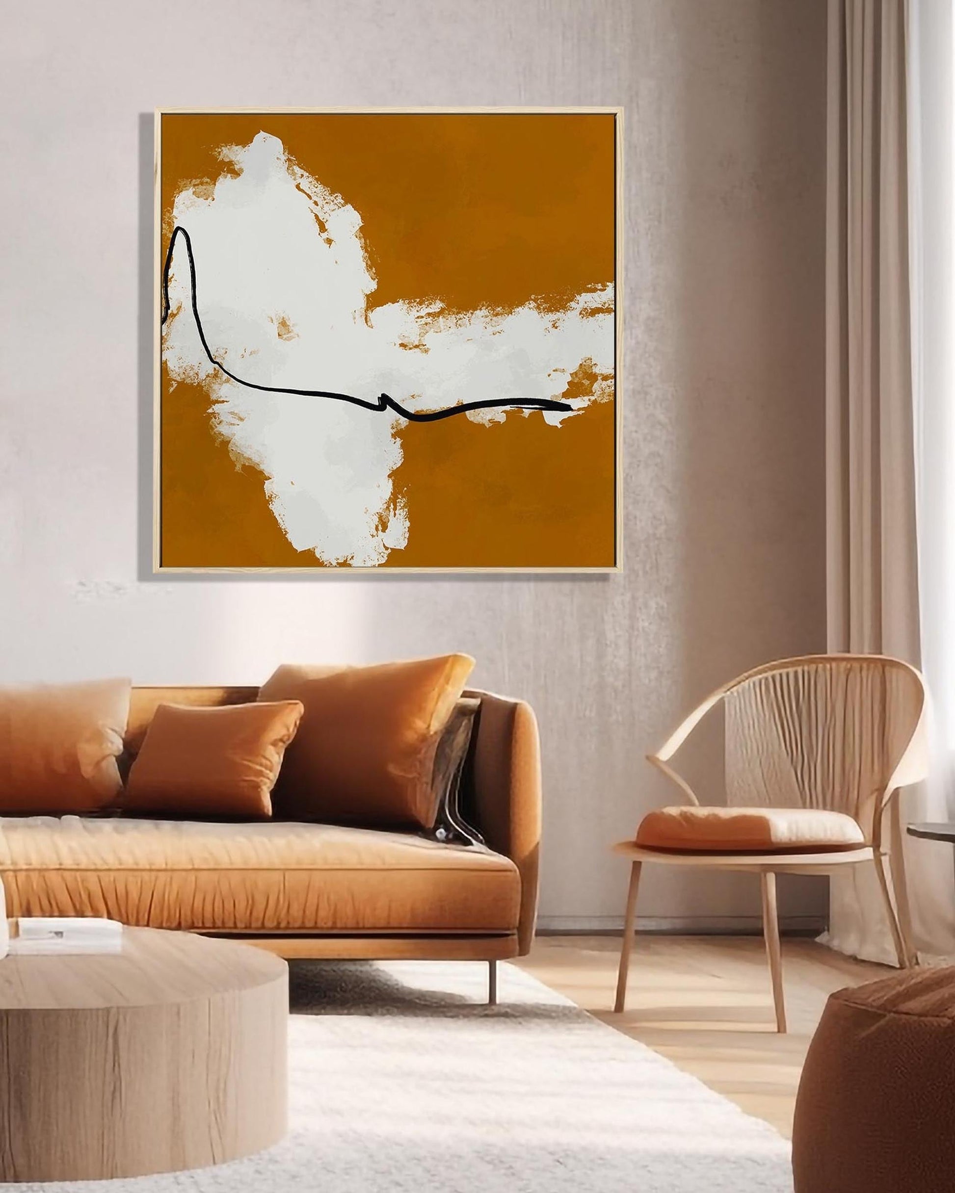 Modern living room with a brown sofa, chair, and abstract art on the wall.