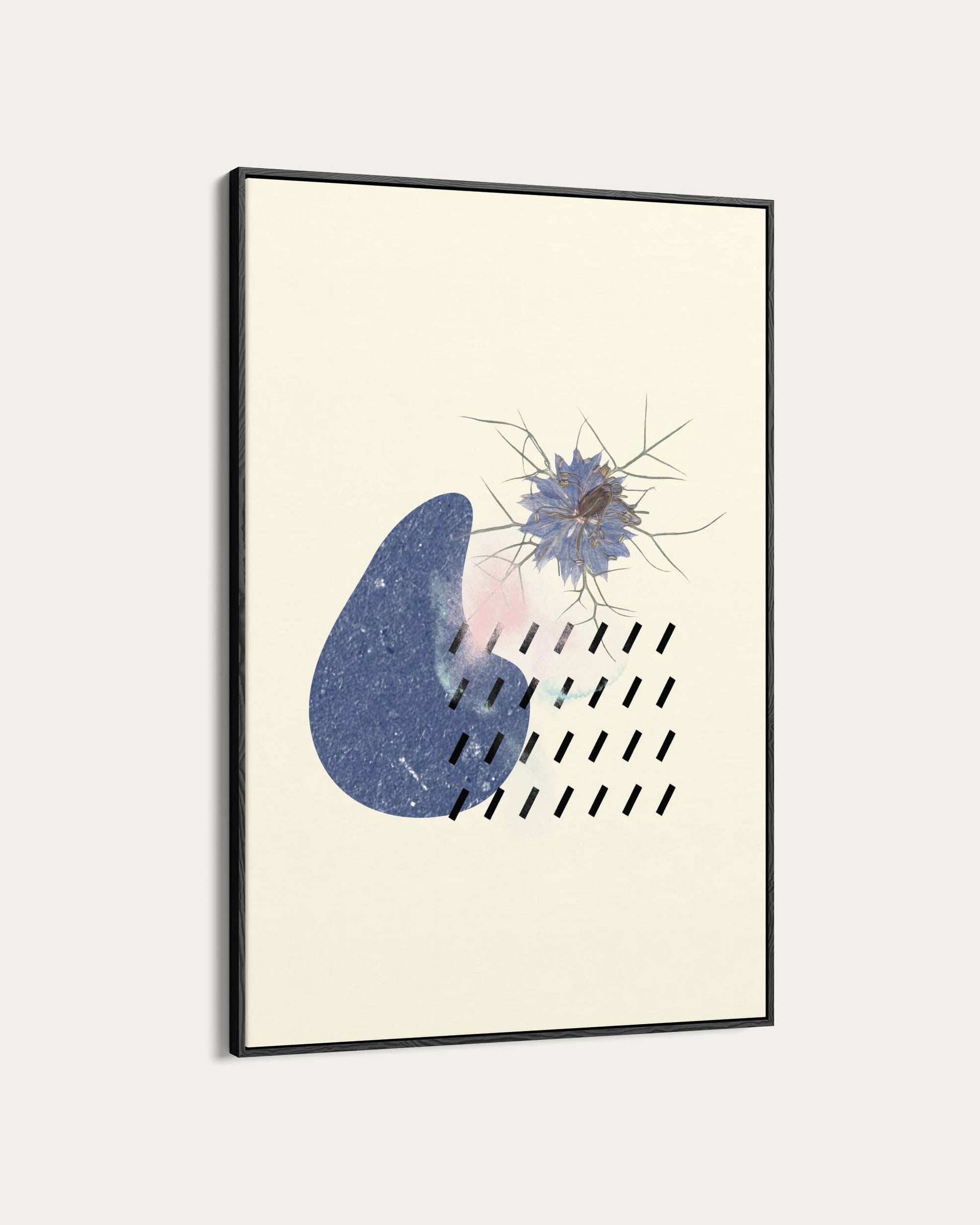 Framed abstract art print with geometric shapes on a light background