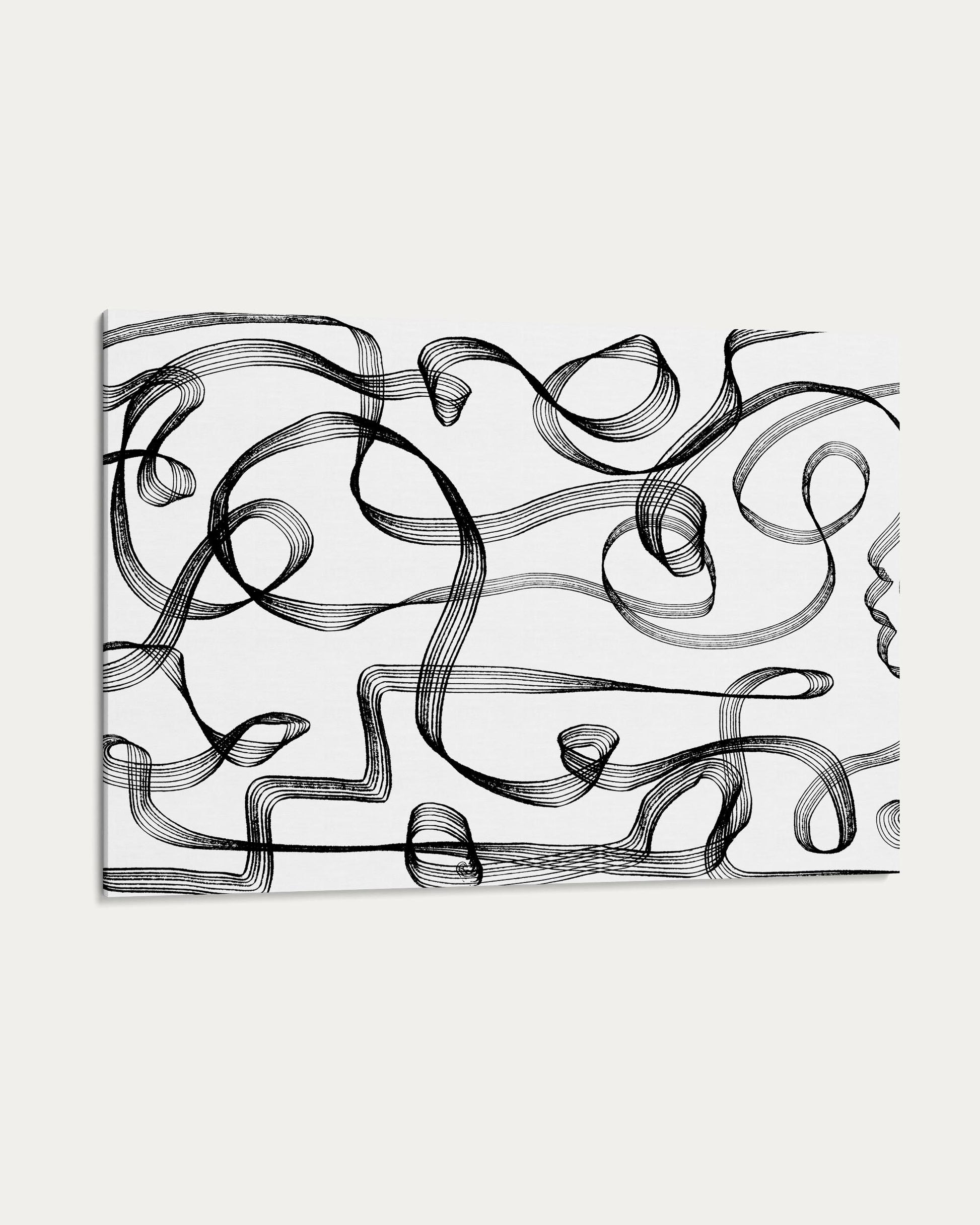 Black abstract brushstroke design on a white background