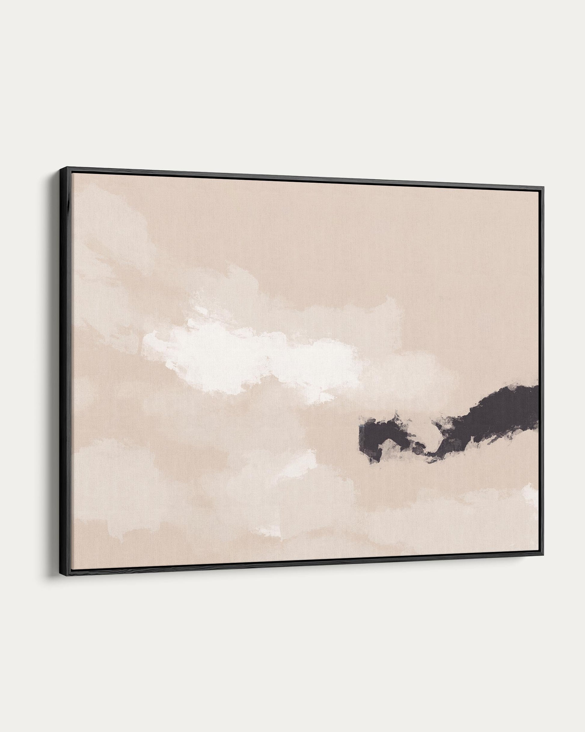 Framed abstract art piece on a white wall