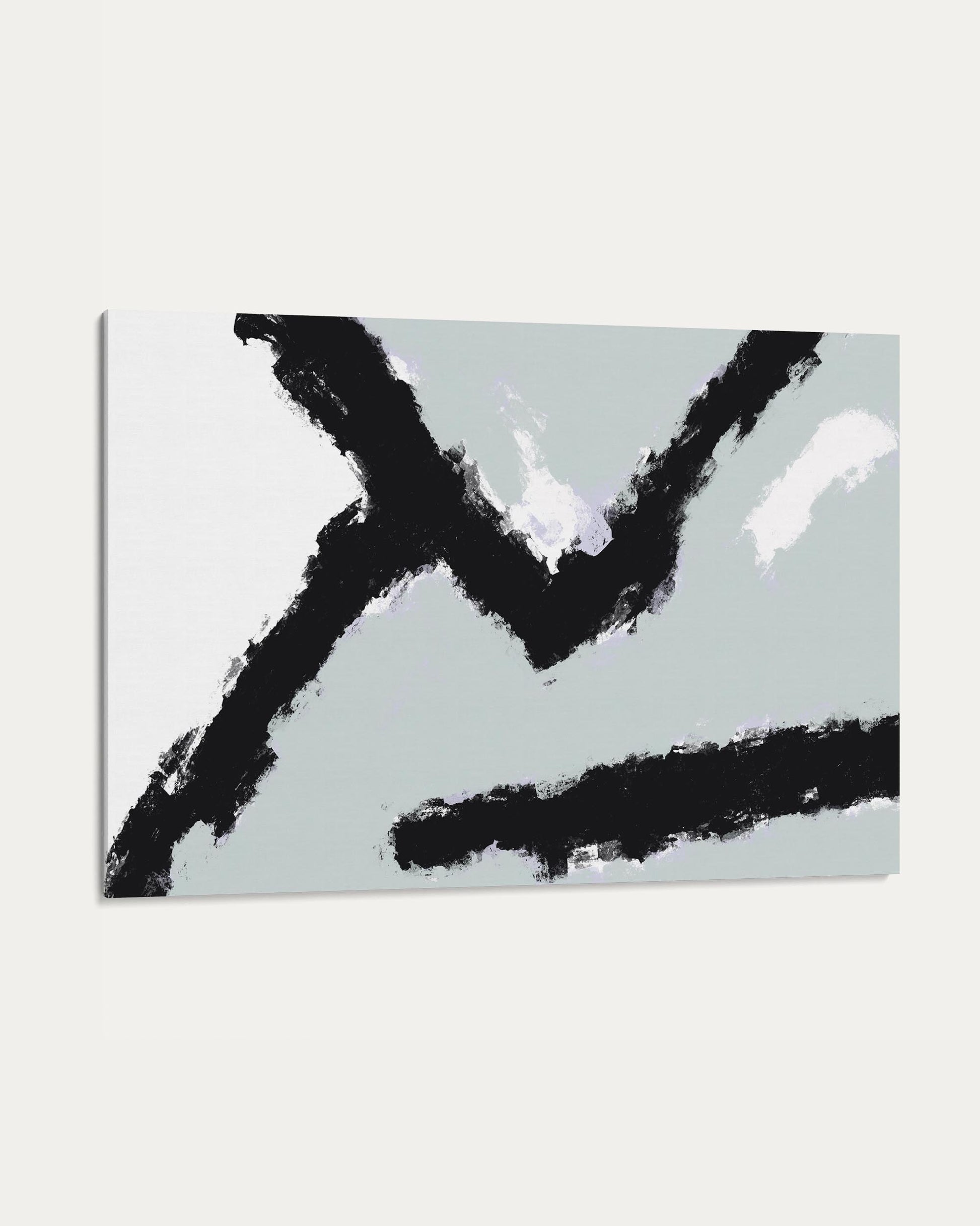 Abstract art piece with black brush strokes on a light gray background