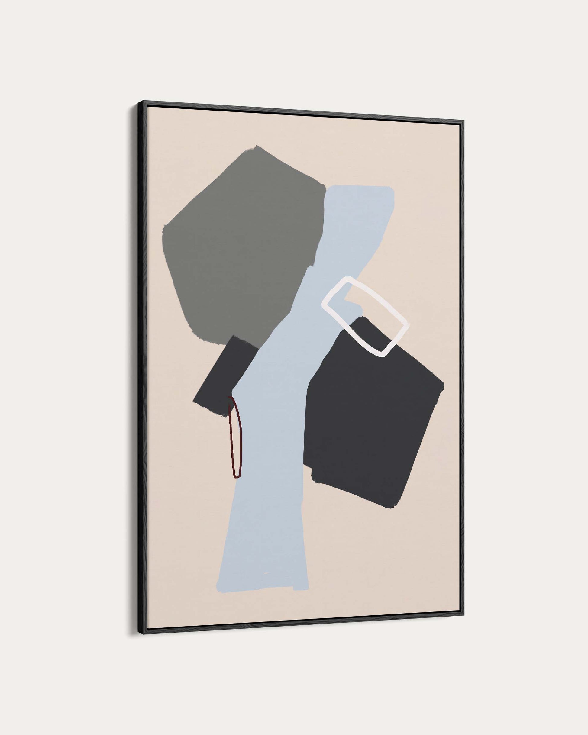 Framed abstract art with geometric shapes on a beige background