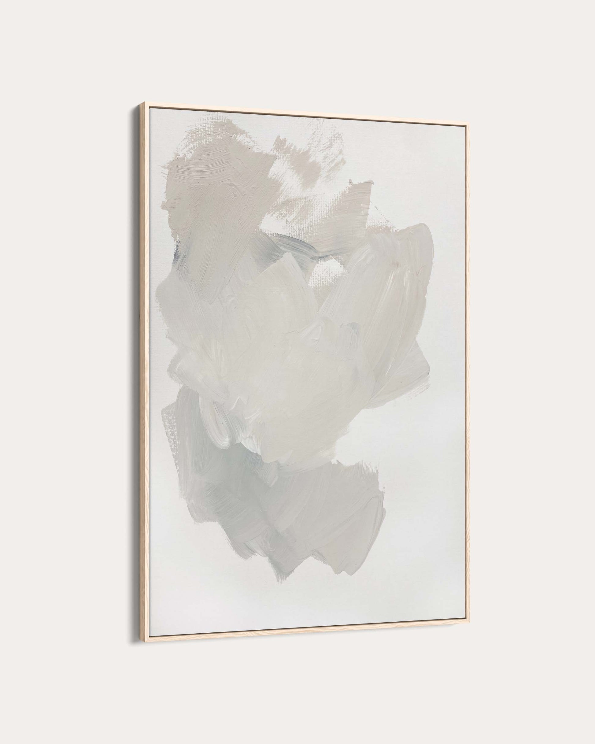 Abstract art piece in a gold frame on a light gray background