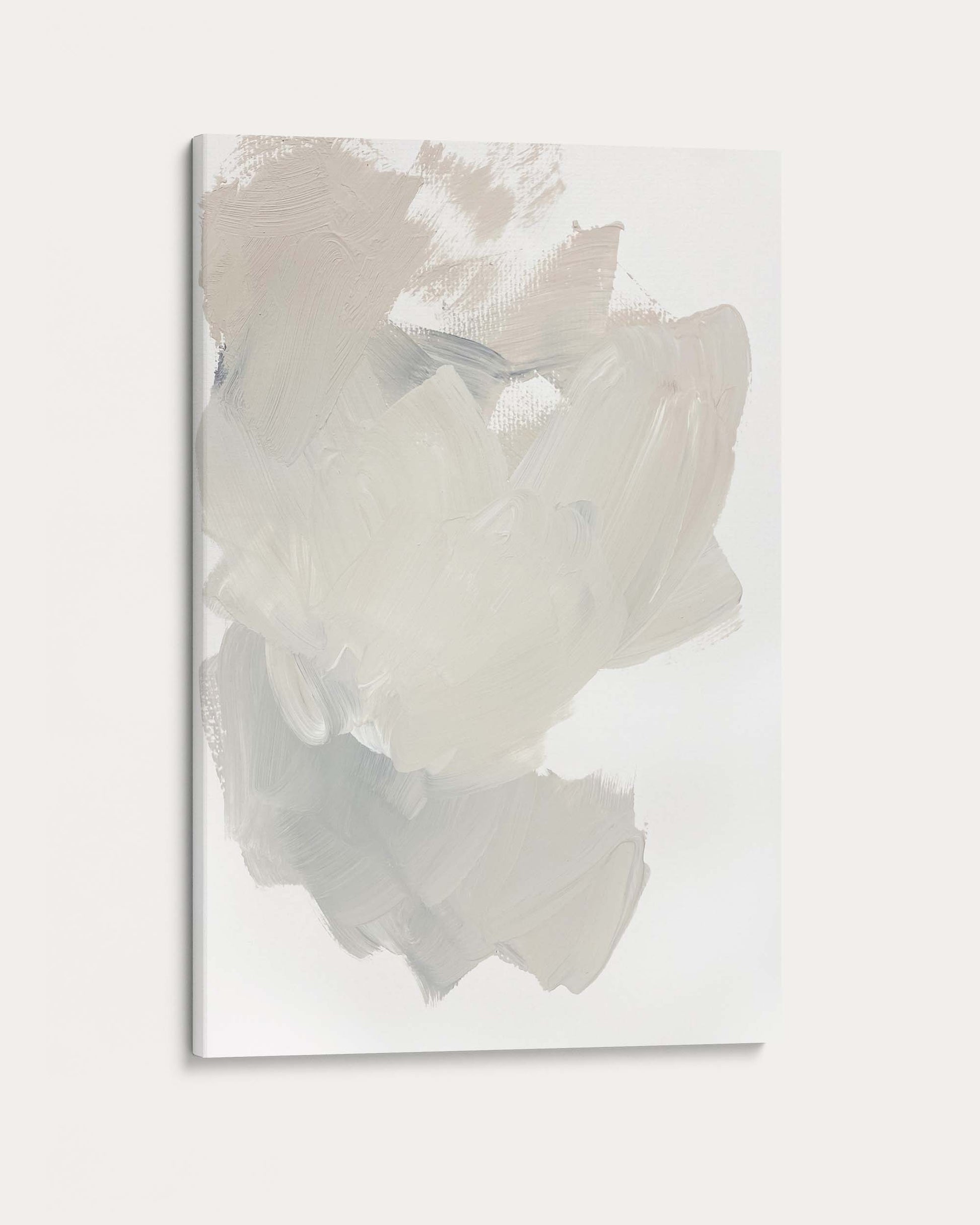 Abstract art piece with white and gray shapes on a light gray background