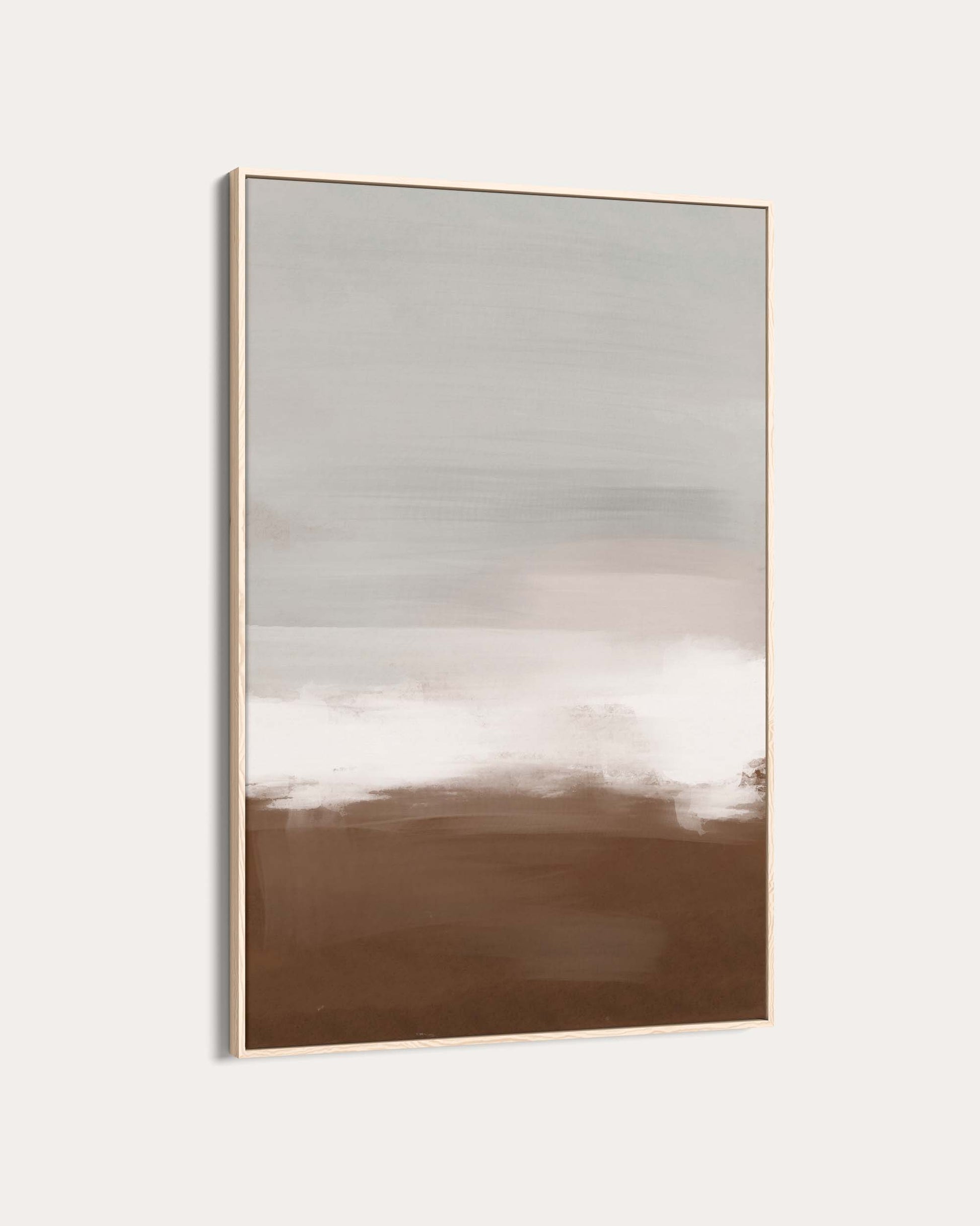 Framed artwork with a landscape of water and sky on a light gray background