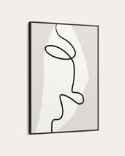 Framed abstract line art of a face on a light gray background