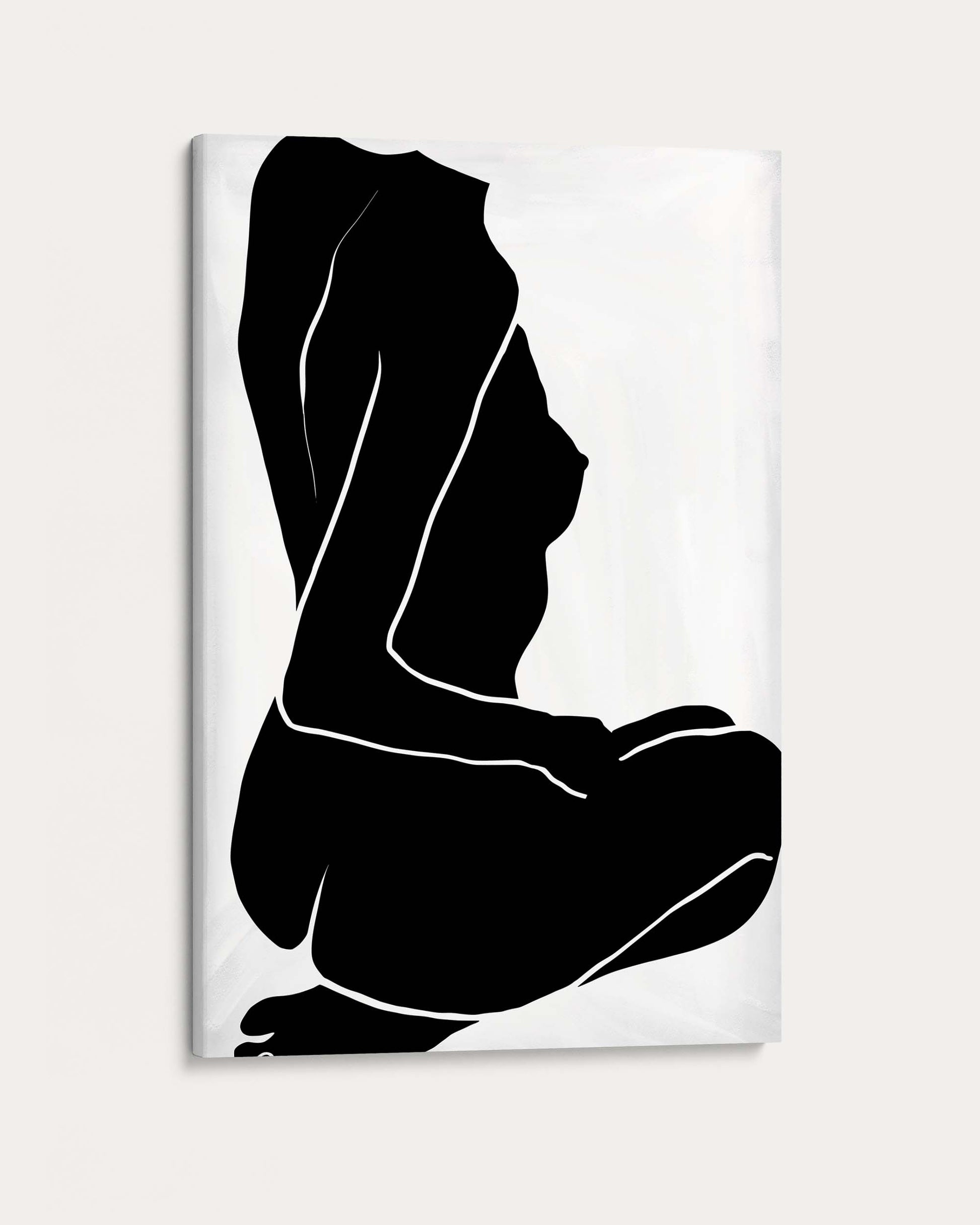 Black silhouette of a person sitting on a white background