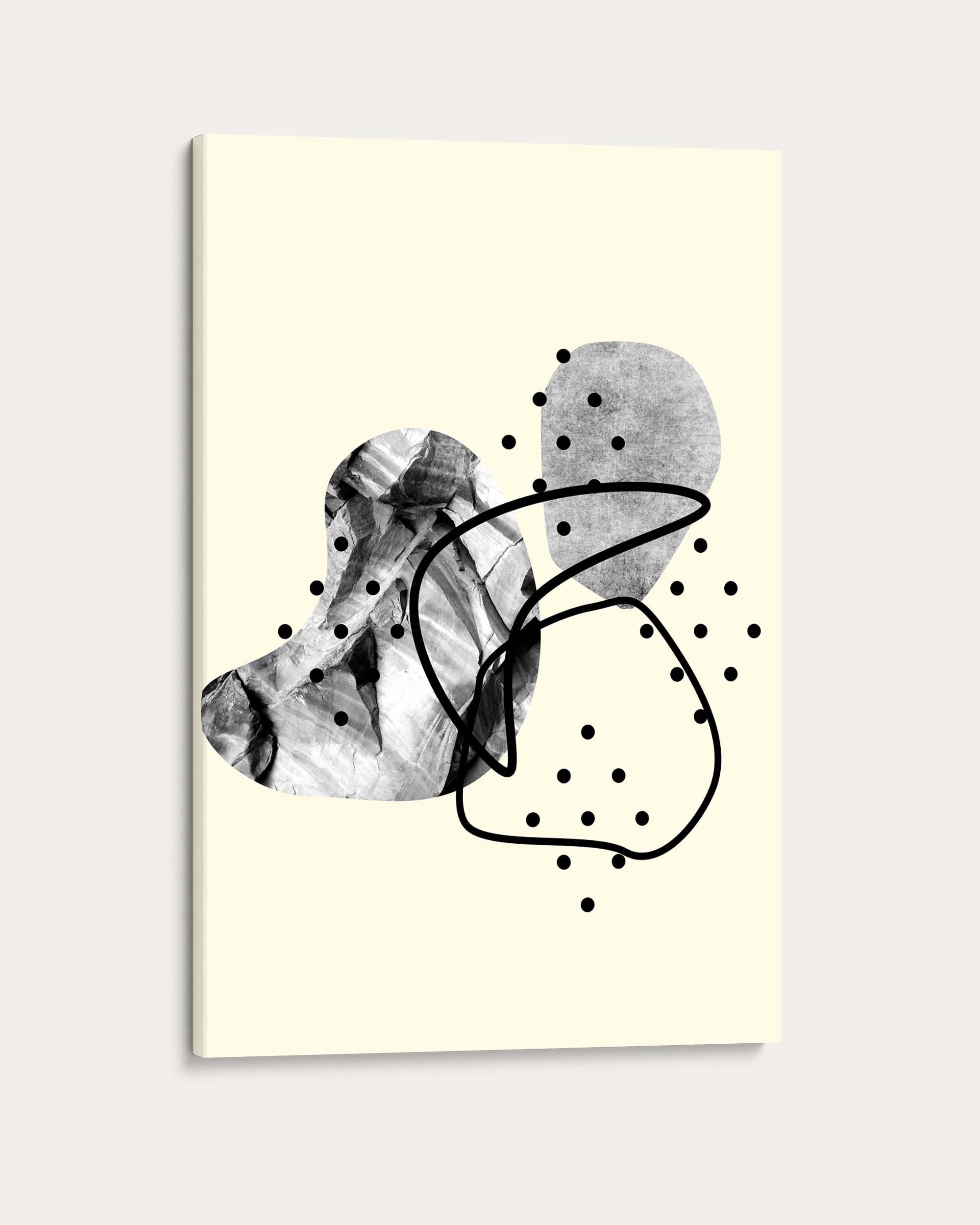 Abstract art print with black and gray shapes on a light yellow background