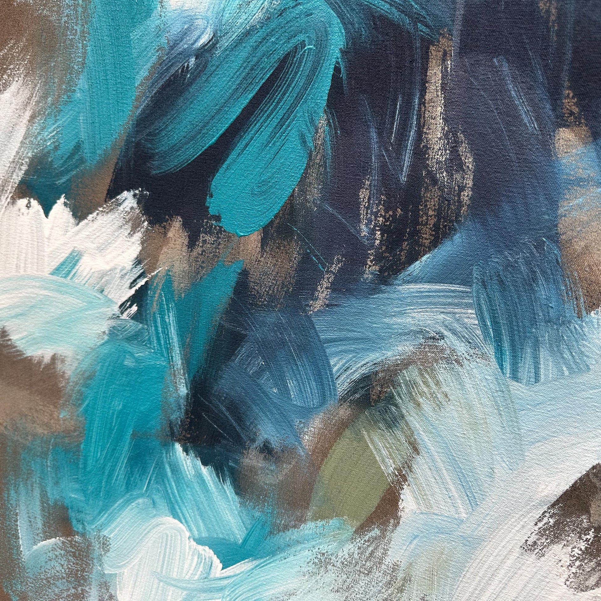 Close up photograph of a spontaneous abstract painting with large thick brush strokes in teal, blue, white and brown.