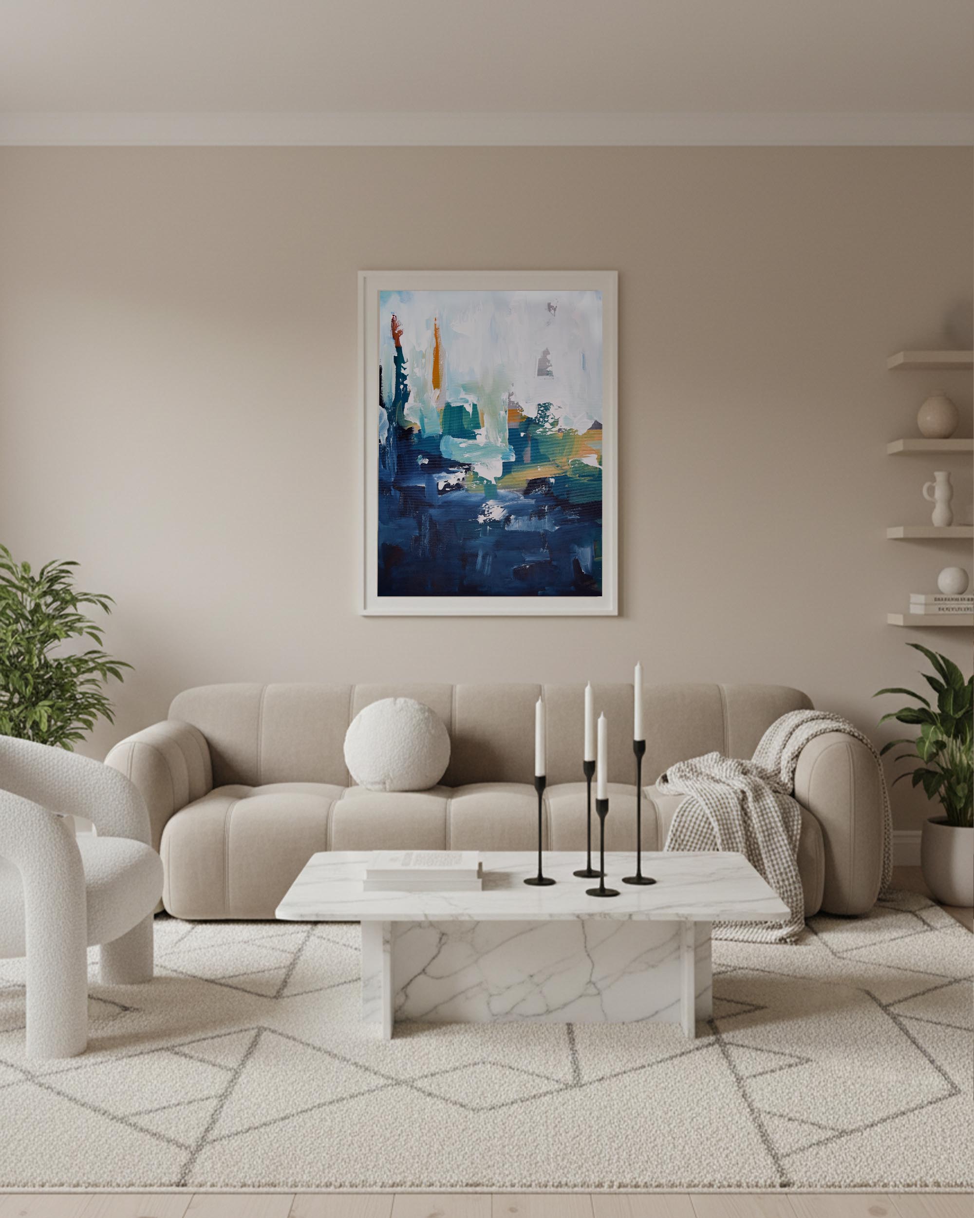 coastal home large living room with cream bubble chesterfield style sofa, large blue navy and white abstract painting print on the wall, modern original art in Japandi interior design with candleabra and white marble coffee table