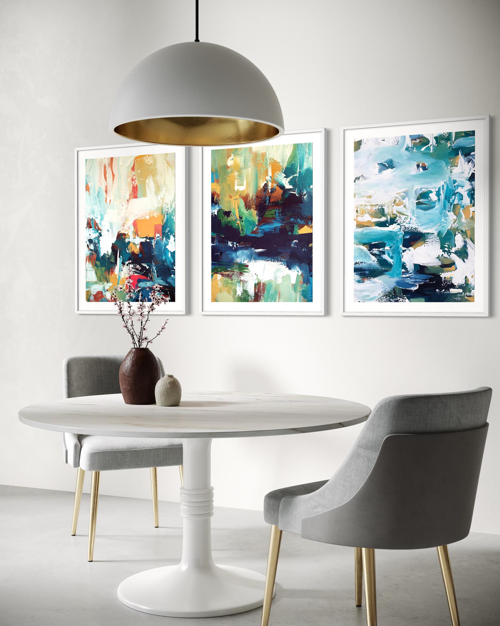 Dining room with a white table, gray chairs, and abstract art on the wall.