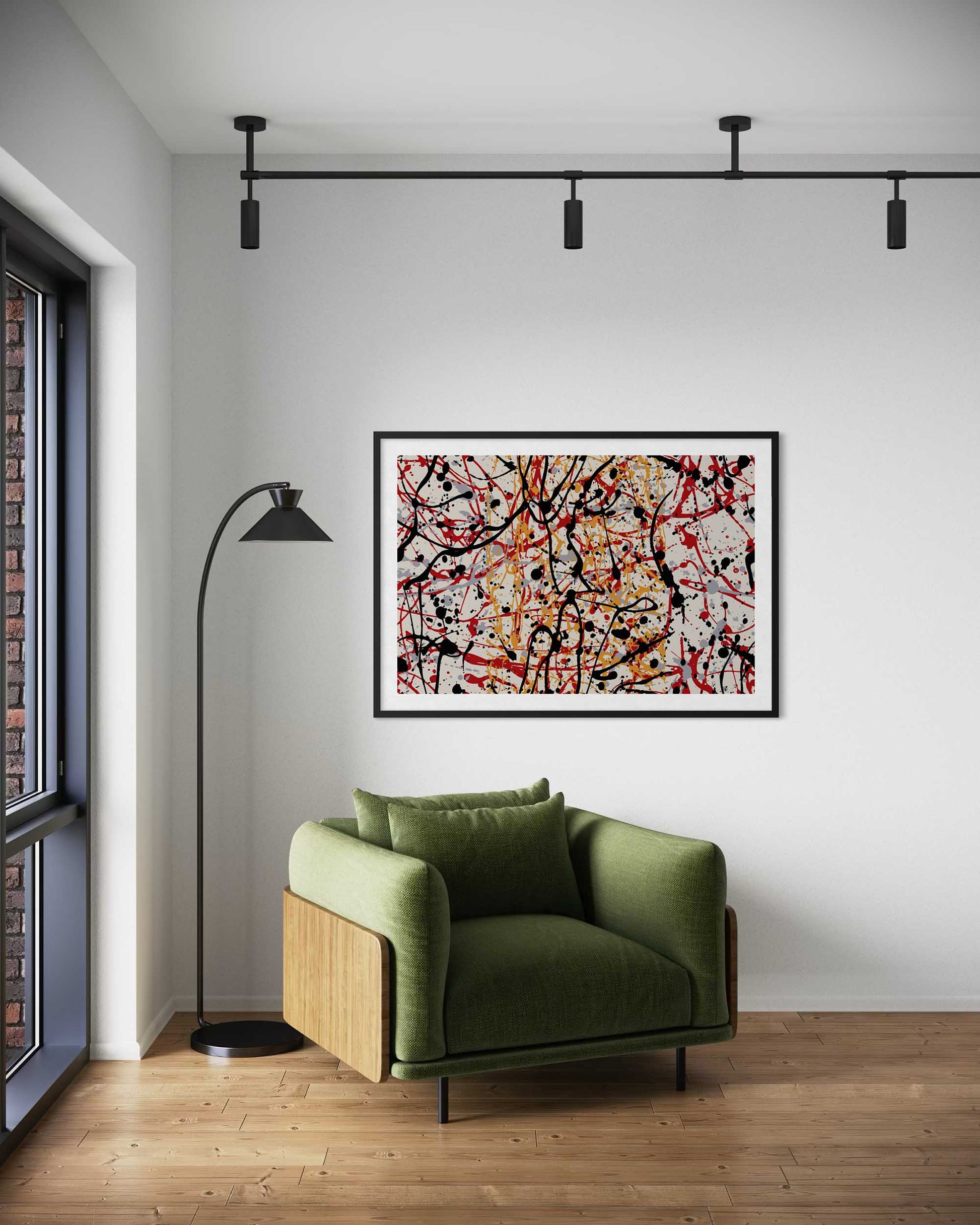 Modern living room with a green armchair, abstract painting, and floor lamp.