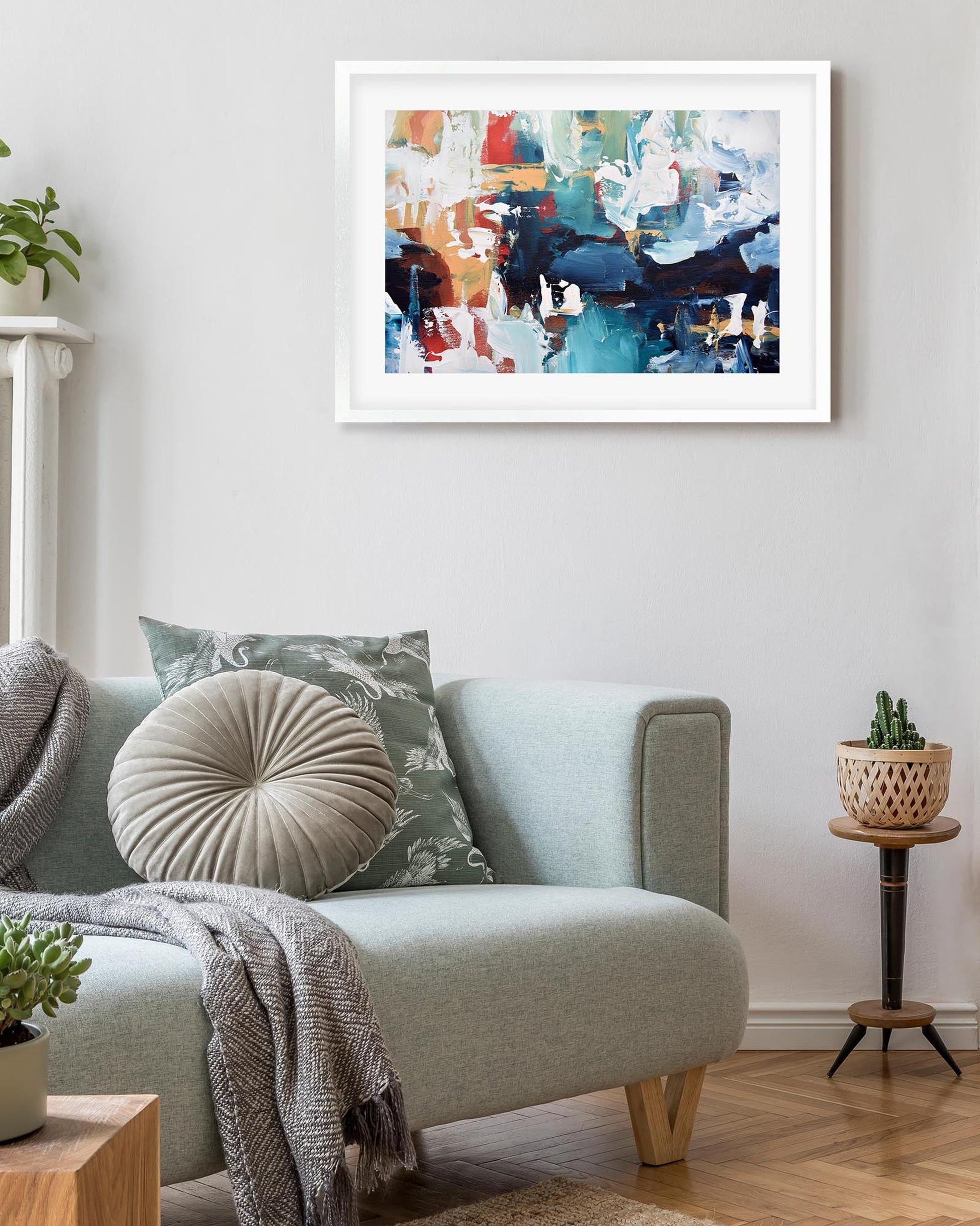framed abstract wall art print on a wall in a modern living room