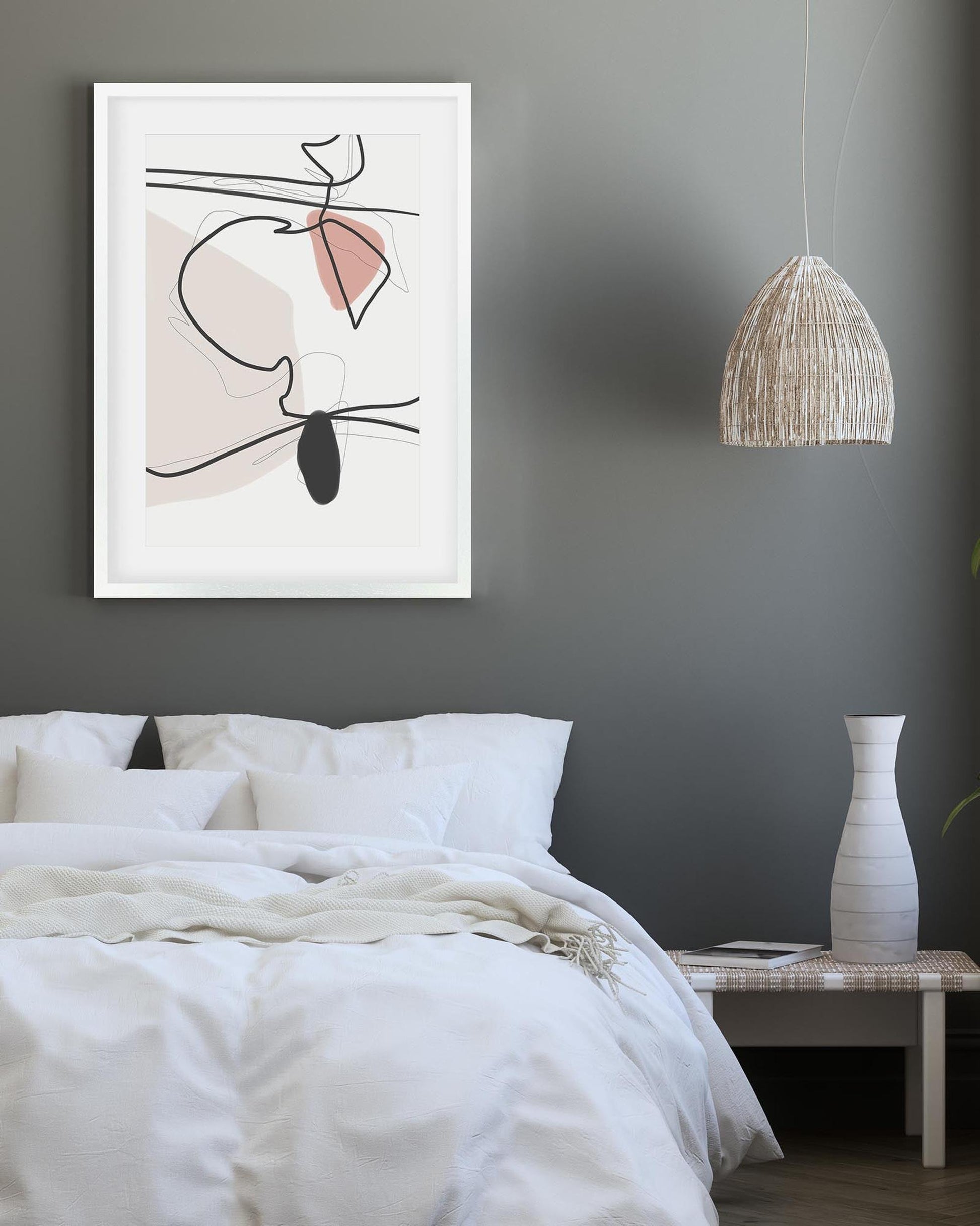 Modern bedroom with abstract art on the wall, white bedding, and a vase on a nightstand.