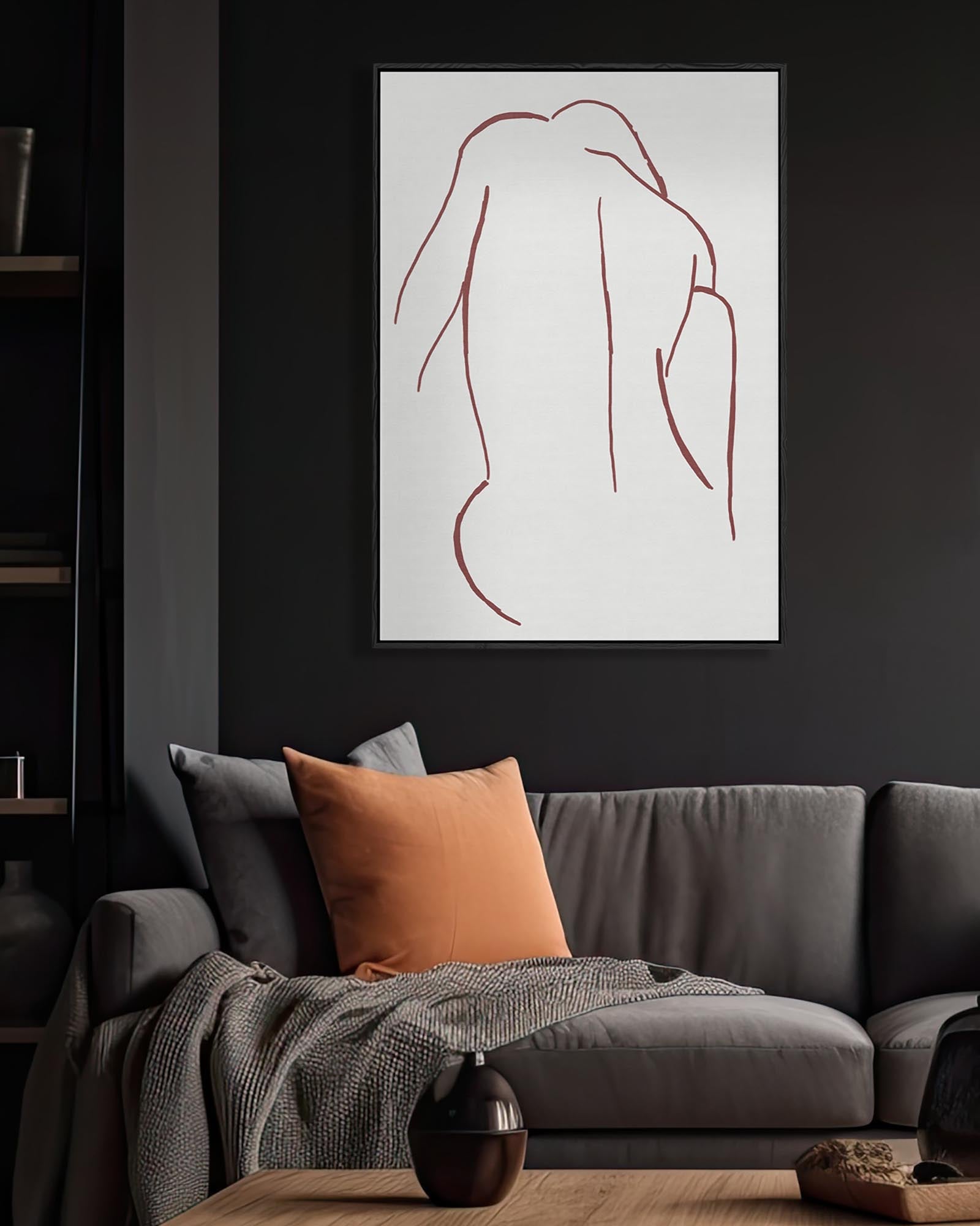 Modern living room with a gray sofa, orange pillow, and abstract line art on the wall.