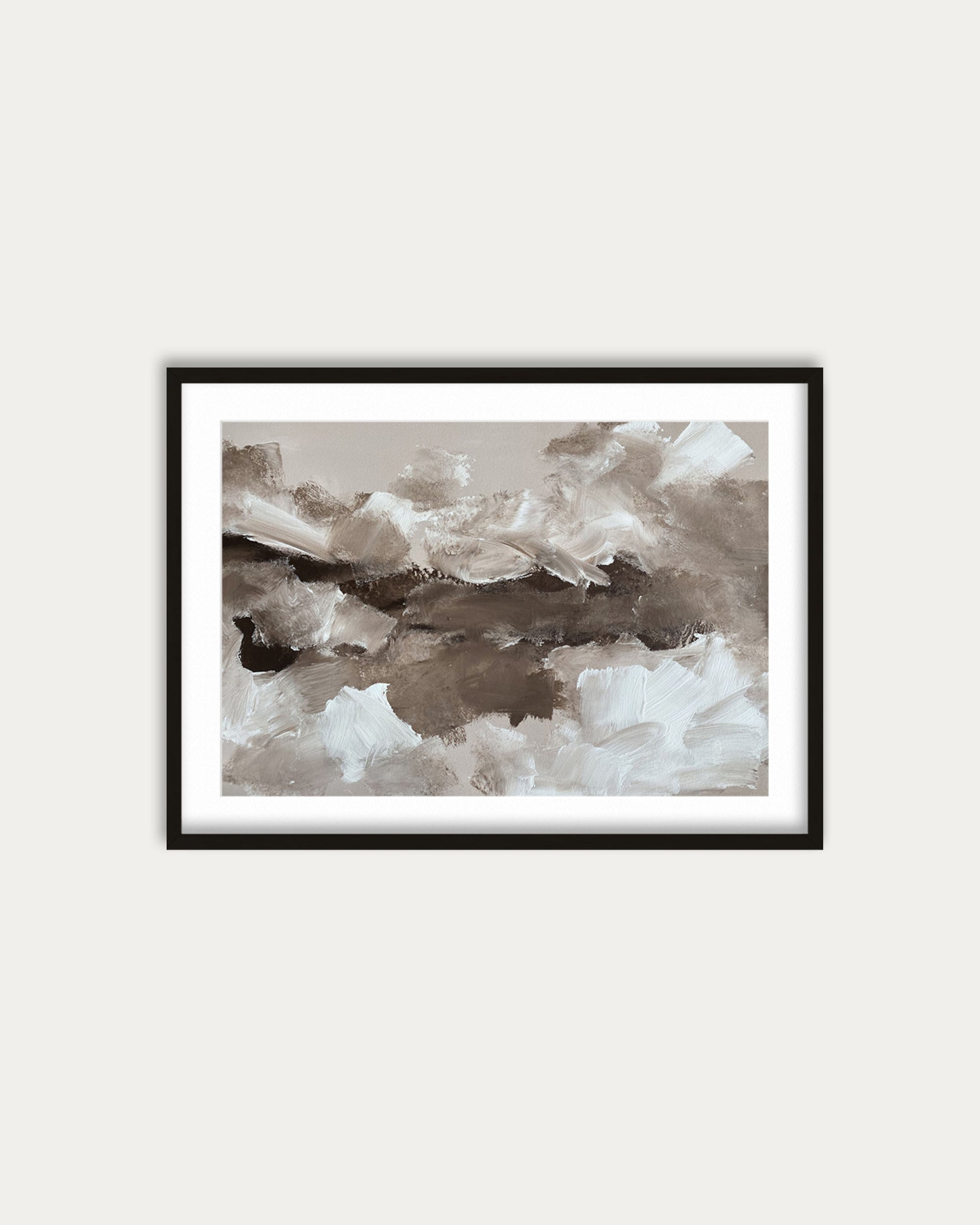 Framed abstract art print on a white wall