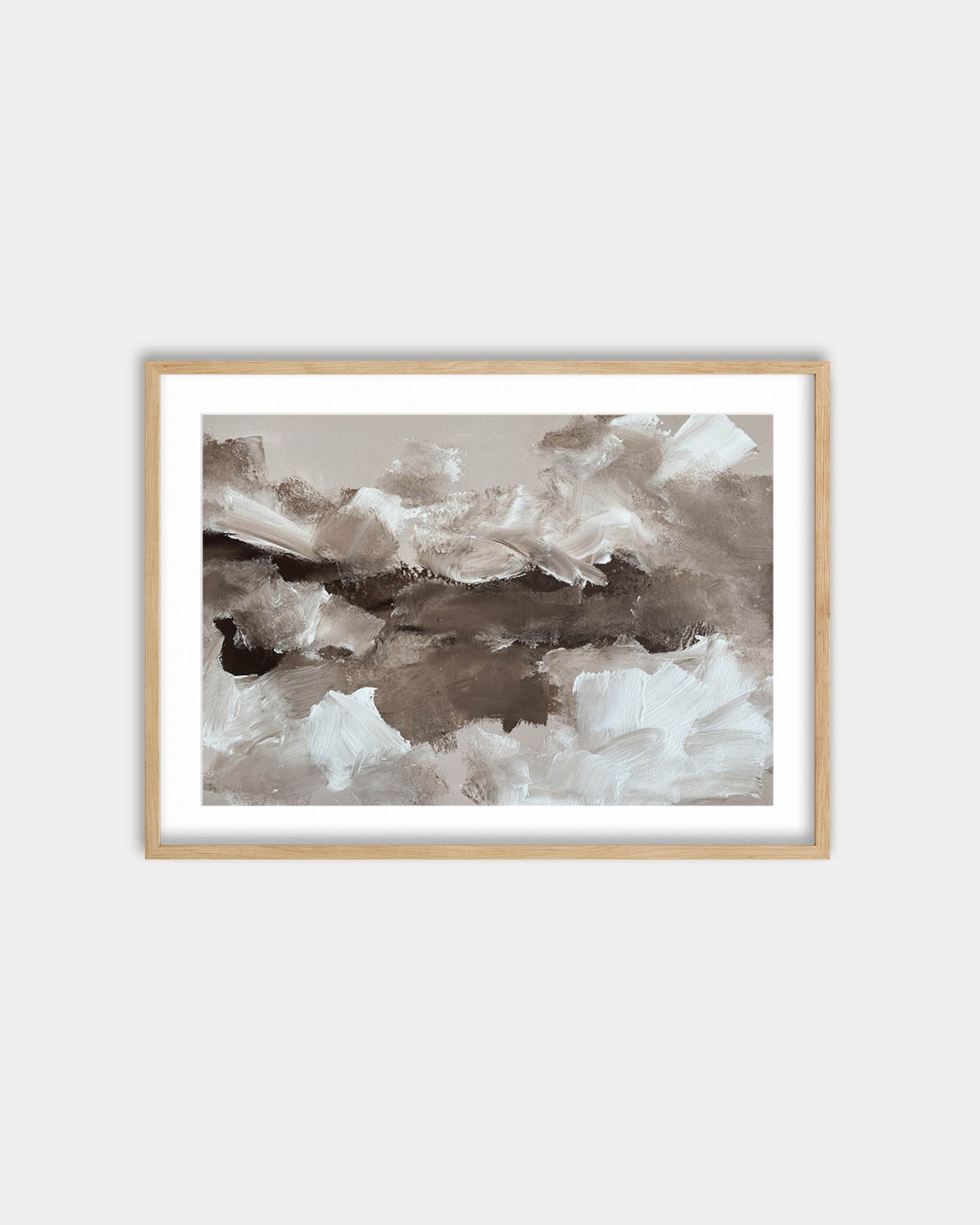 Framed abstract art print on a white wall