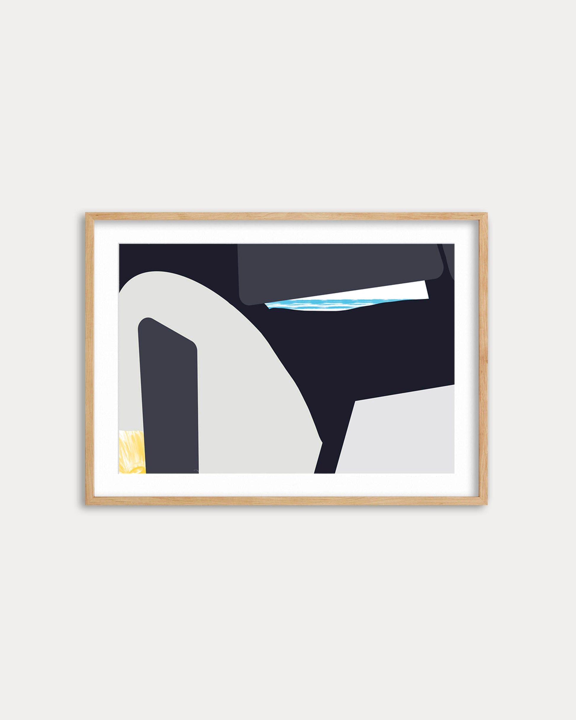Framed abstract art print on a white wall