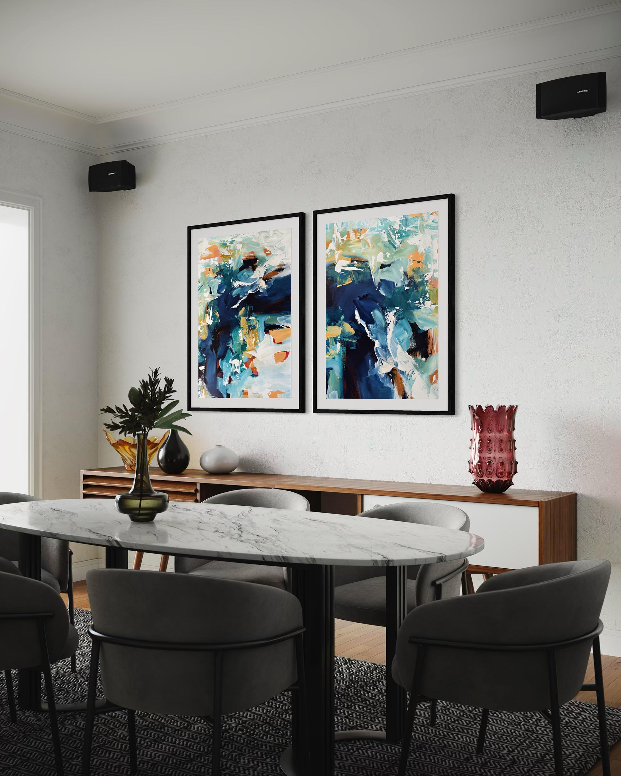 Dining room with marble table and abstract art on the wall
