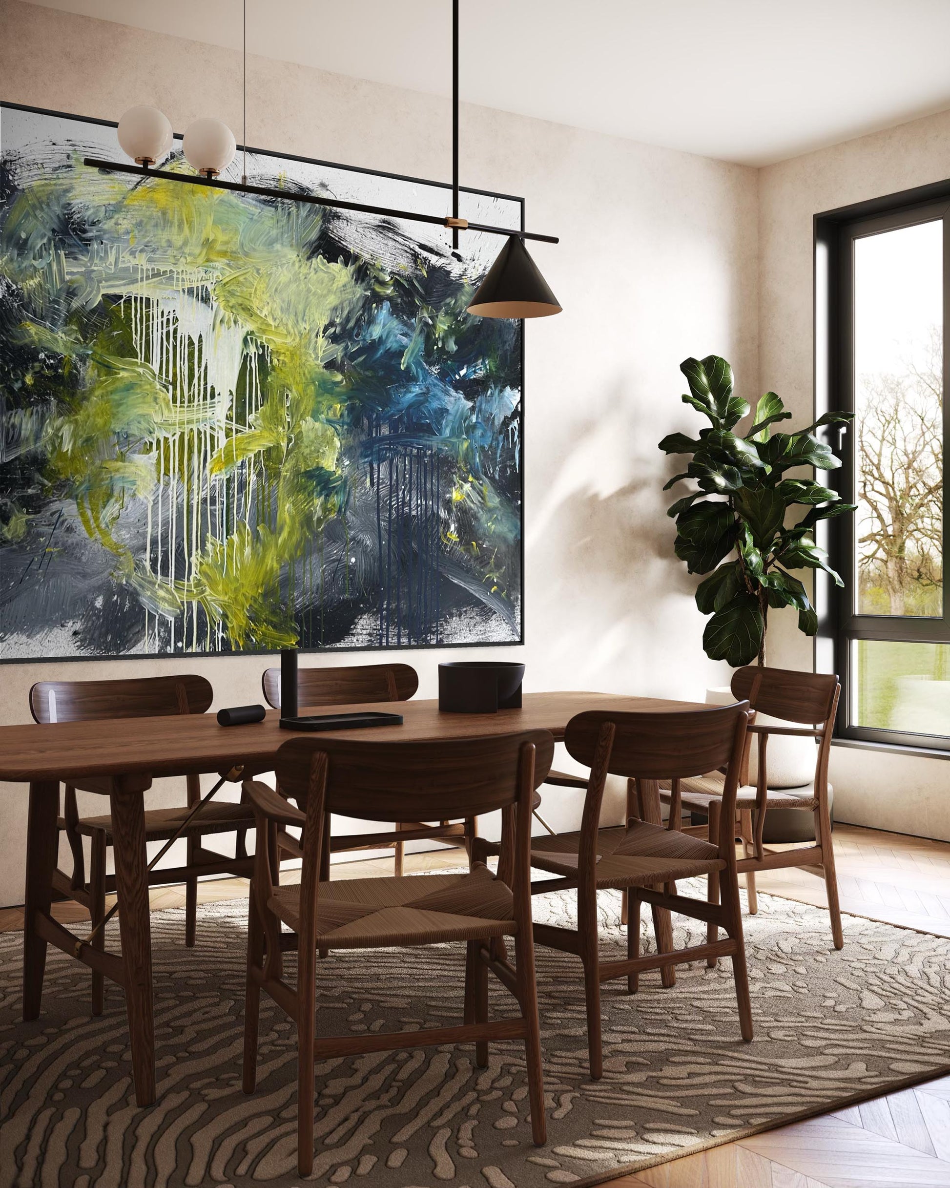 Dining room with wooden table and chairs, abstract painting on the wall, and a plant.