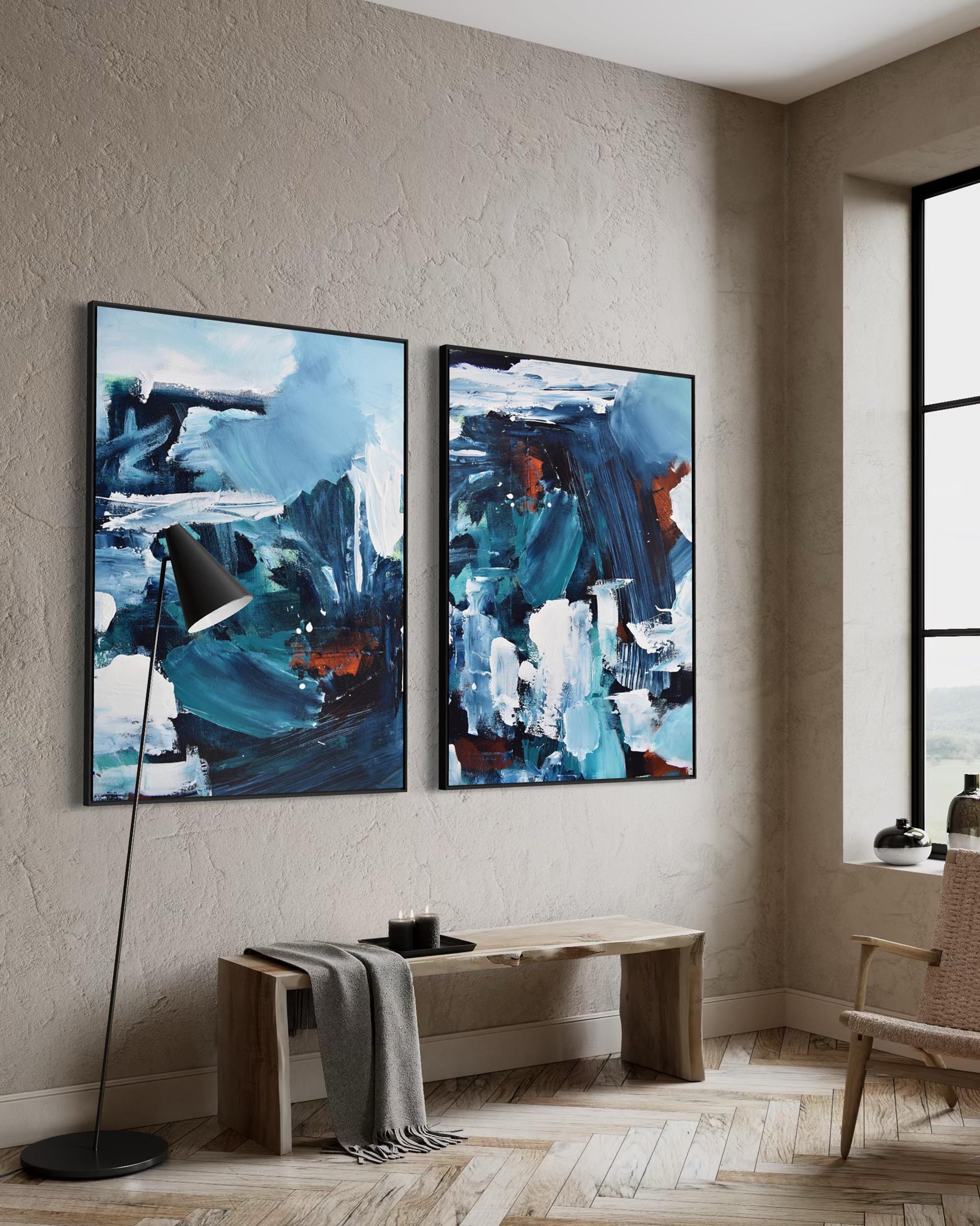 Two abstract paintings on a wall in a modern interior setting.