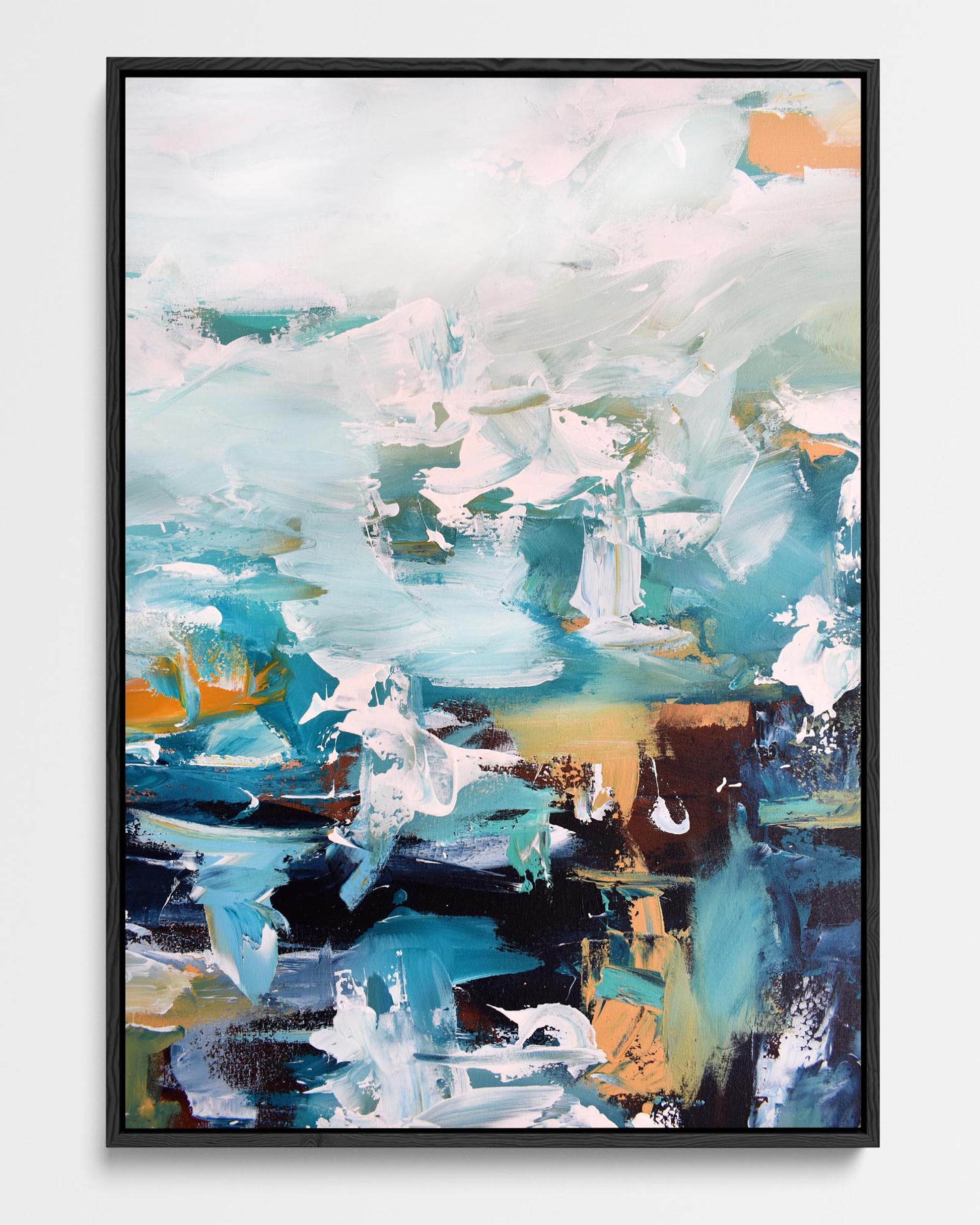 A framed canvas with an abstract design featuring modern blue, white, teal and yellow ochre tones.