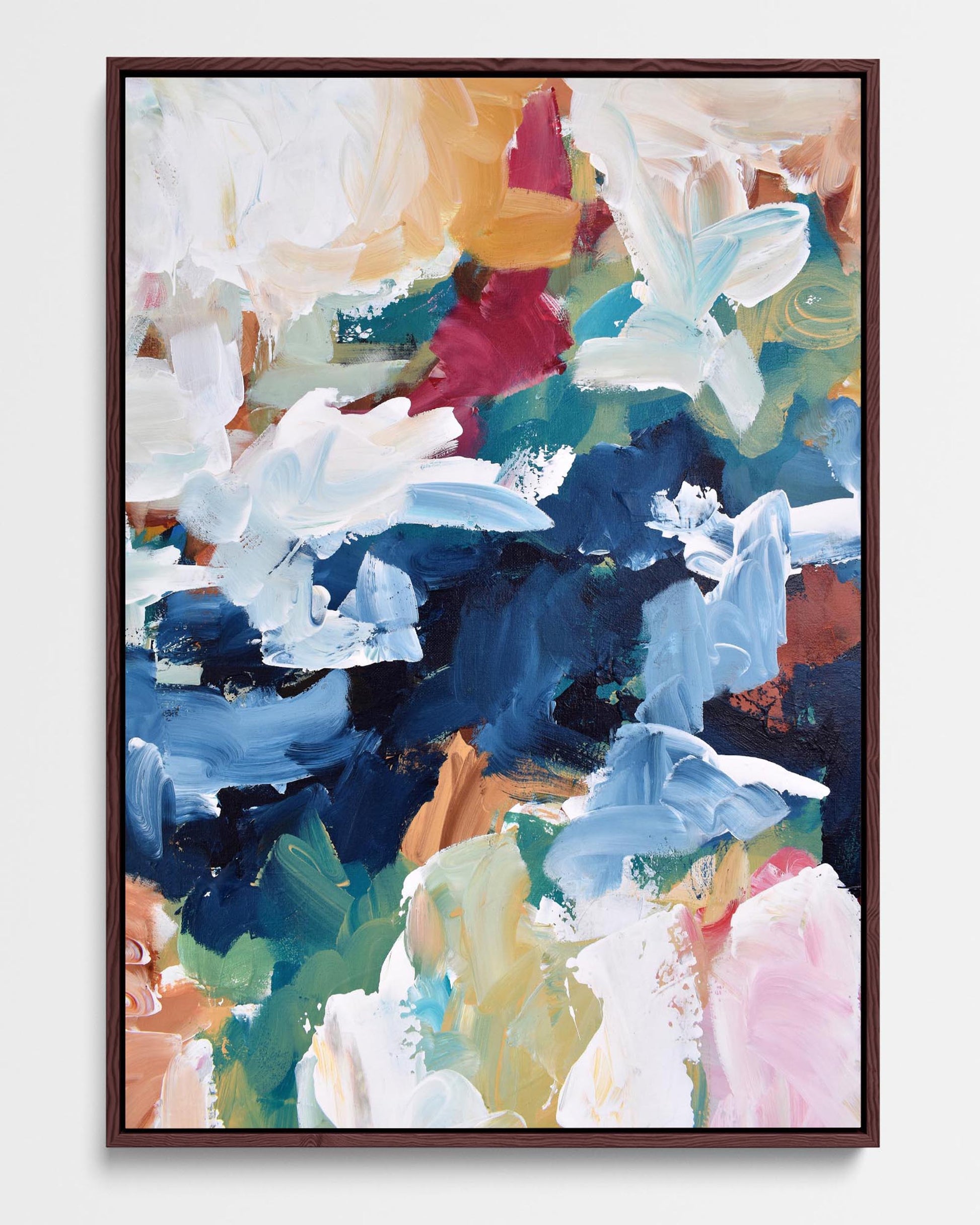 A framed canvas featuring an abstract design with modern blue, white, green, and brown tones.