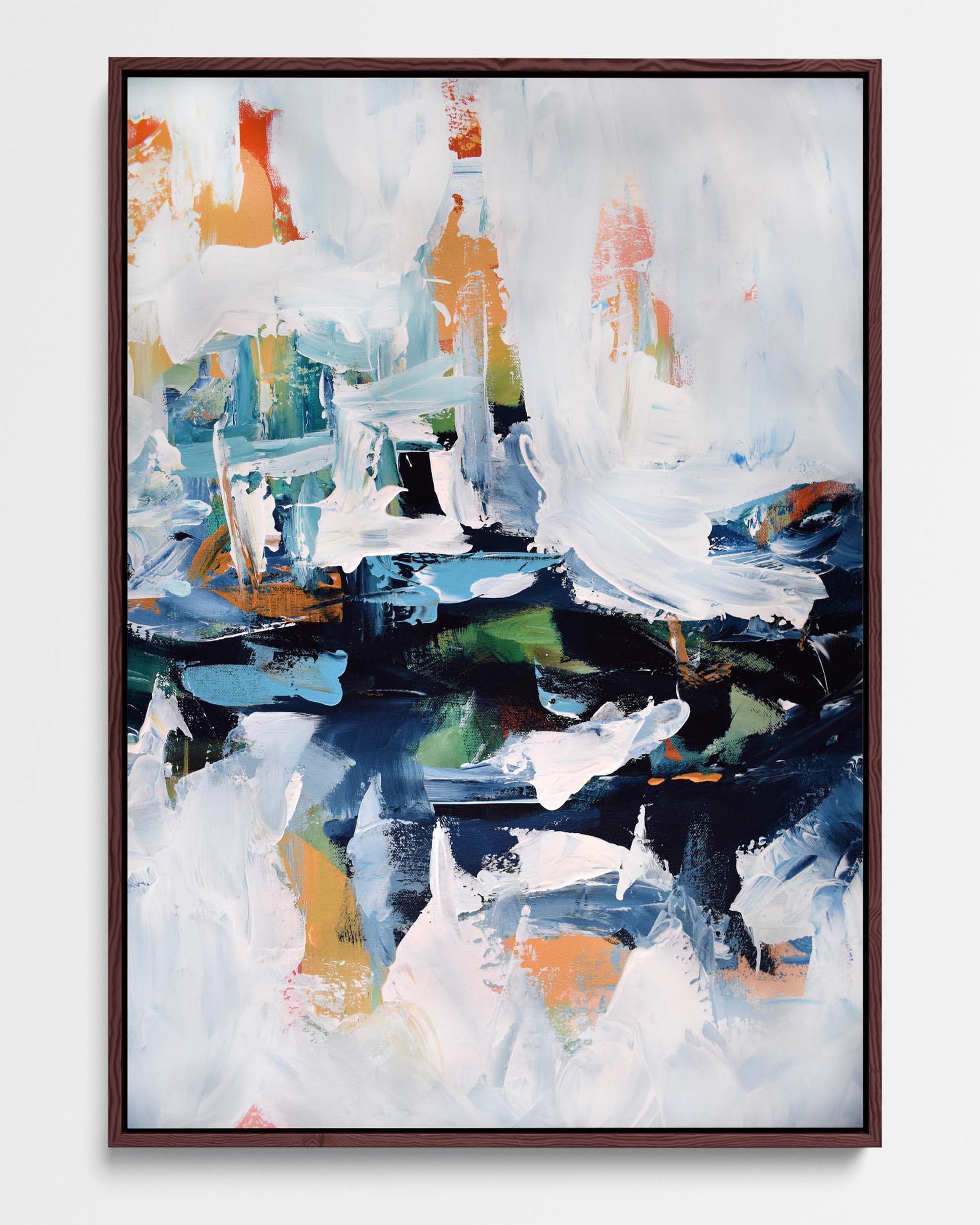 A framed canvas featuring an abstract painting with blue, white, and other colored brush strokes.