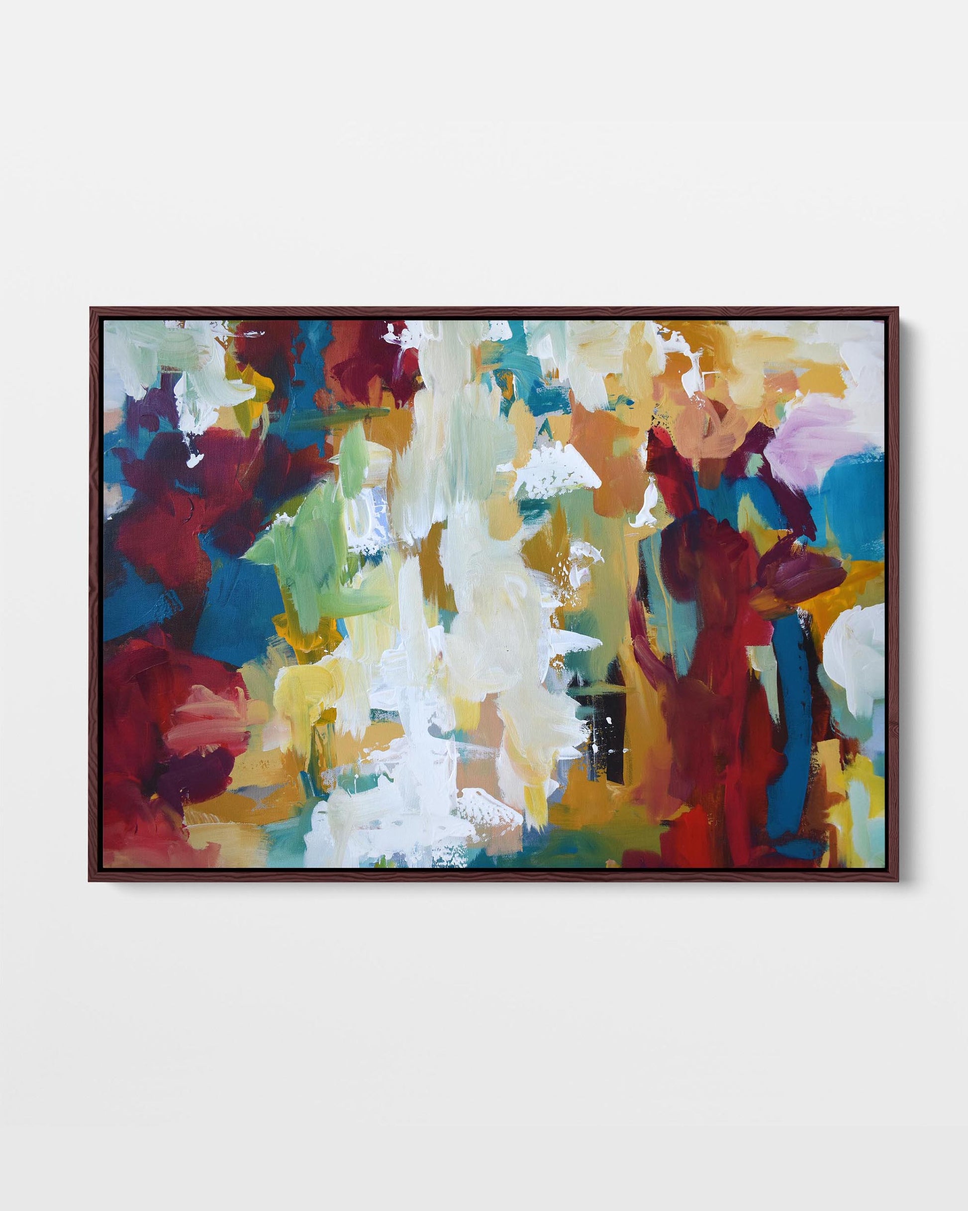 A colorful abstract painting framed in a rectangular canvas with a visible wooden frame, set against a white background.