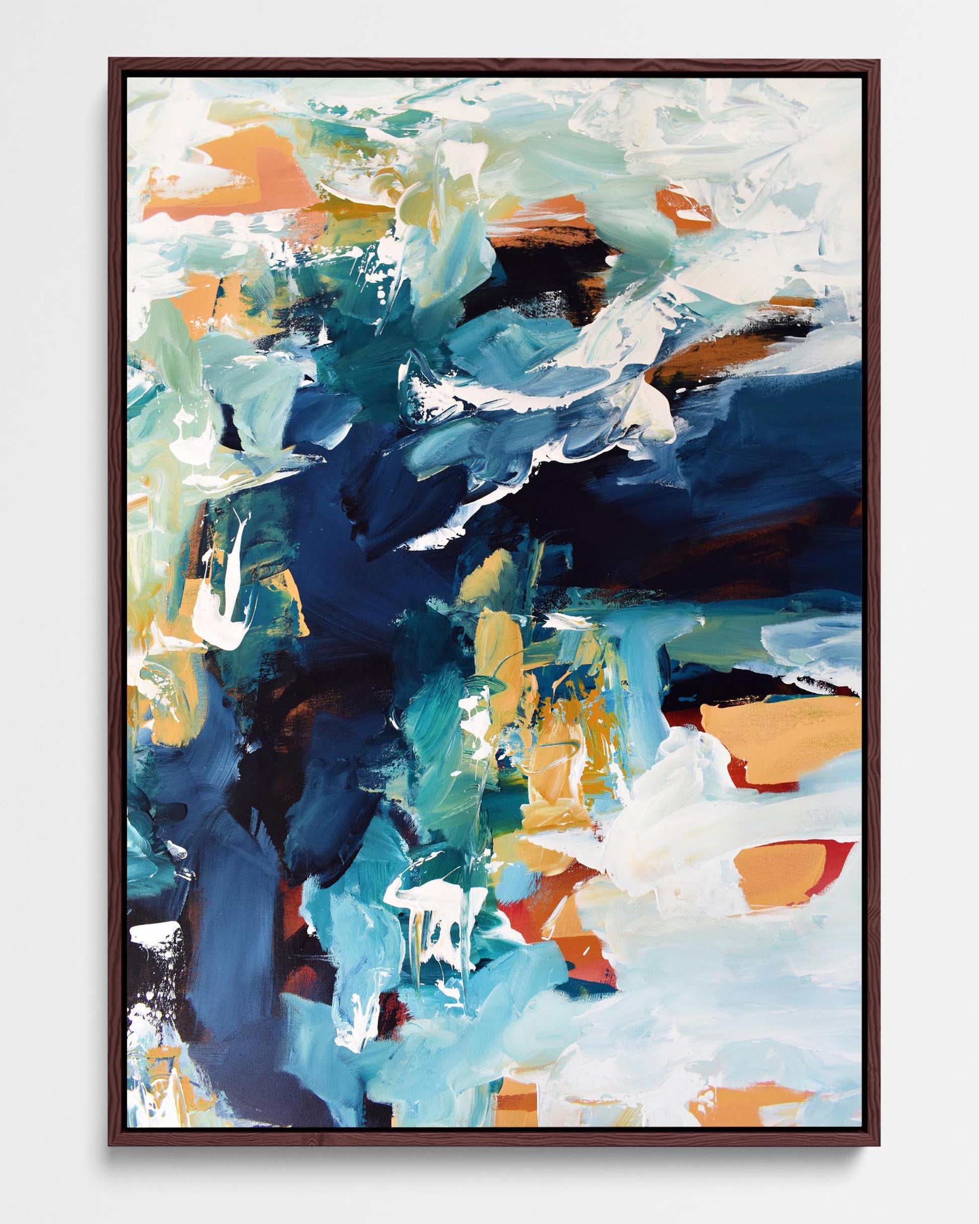 A framed canvas with an abstract design featuring modern blue, teal, white, and yellow ochre tones.
