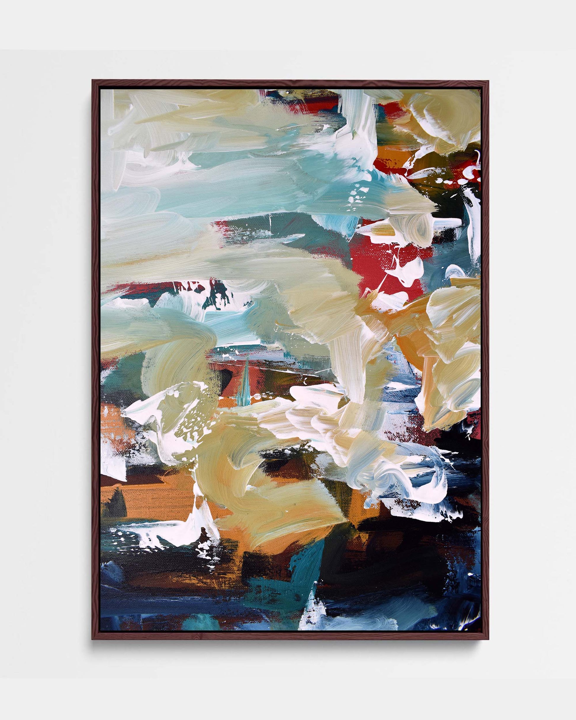 A large abstract painting on canvas with a mix of bright and muted colors, framed in a warm wood tone.